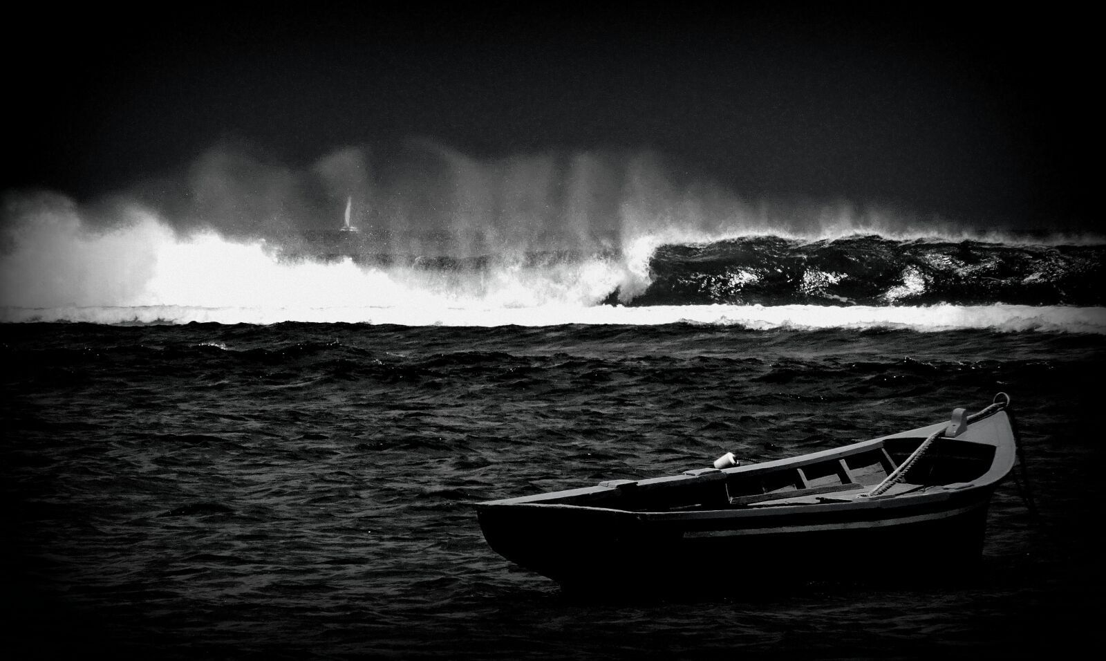 Sony Cyber-shot DSC-WX350 sample photo. Black-and-white image, wave, boat photography