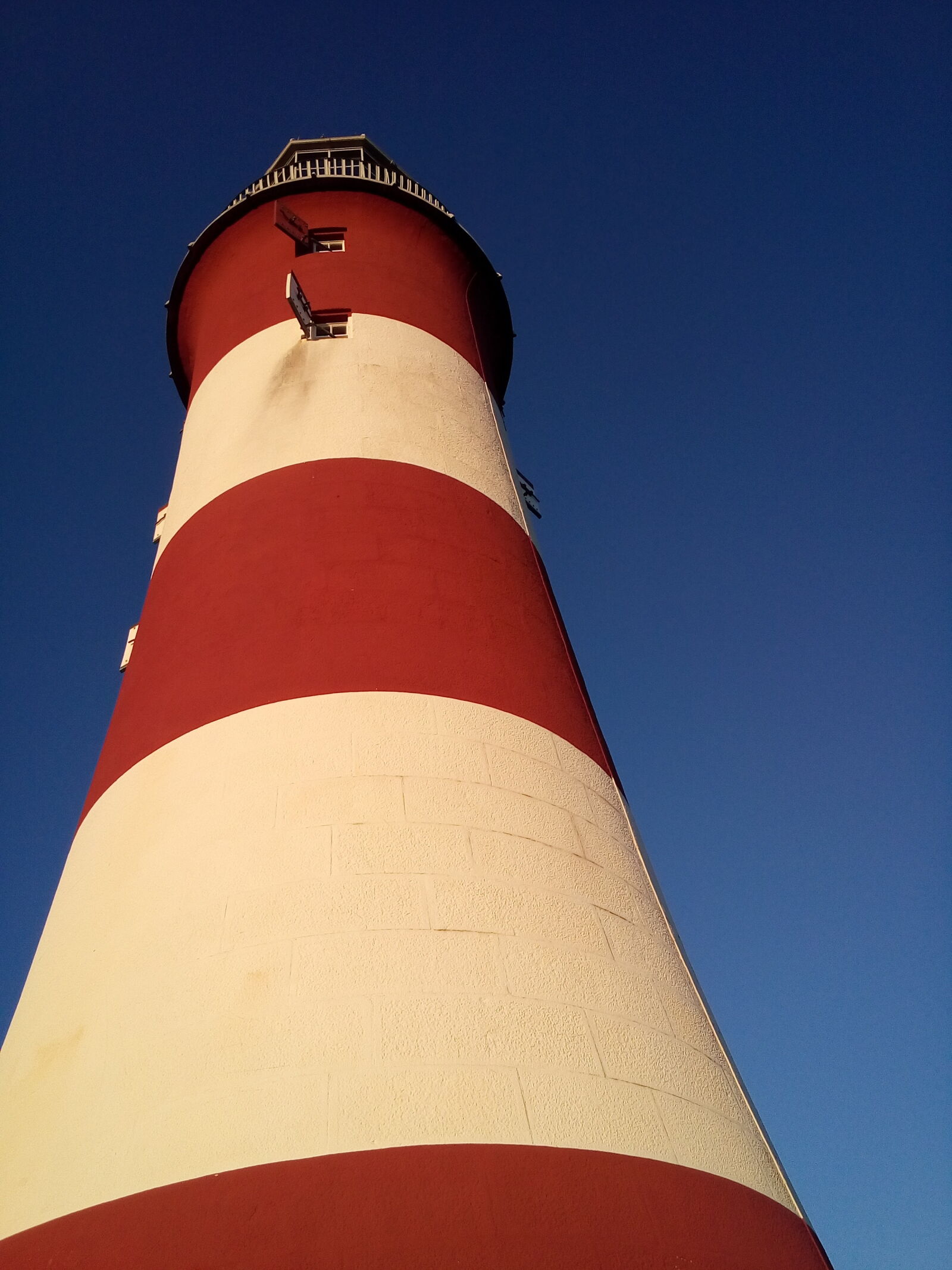 LG H500F sample photo. Blue, sky, lighthouse, red photography