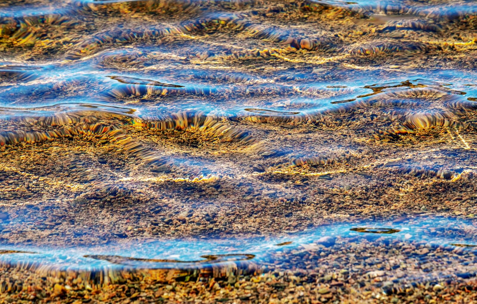 Fujifilm XF 55-200mm F3.5-4.8 R LM OIS sample photo. Lake, water, stones photography
