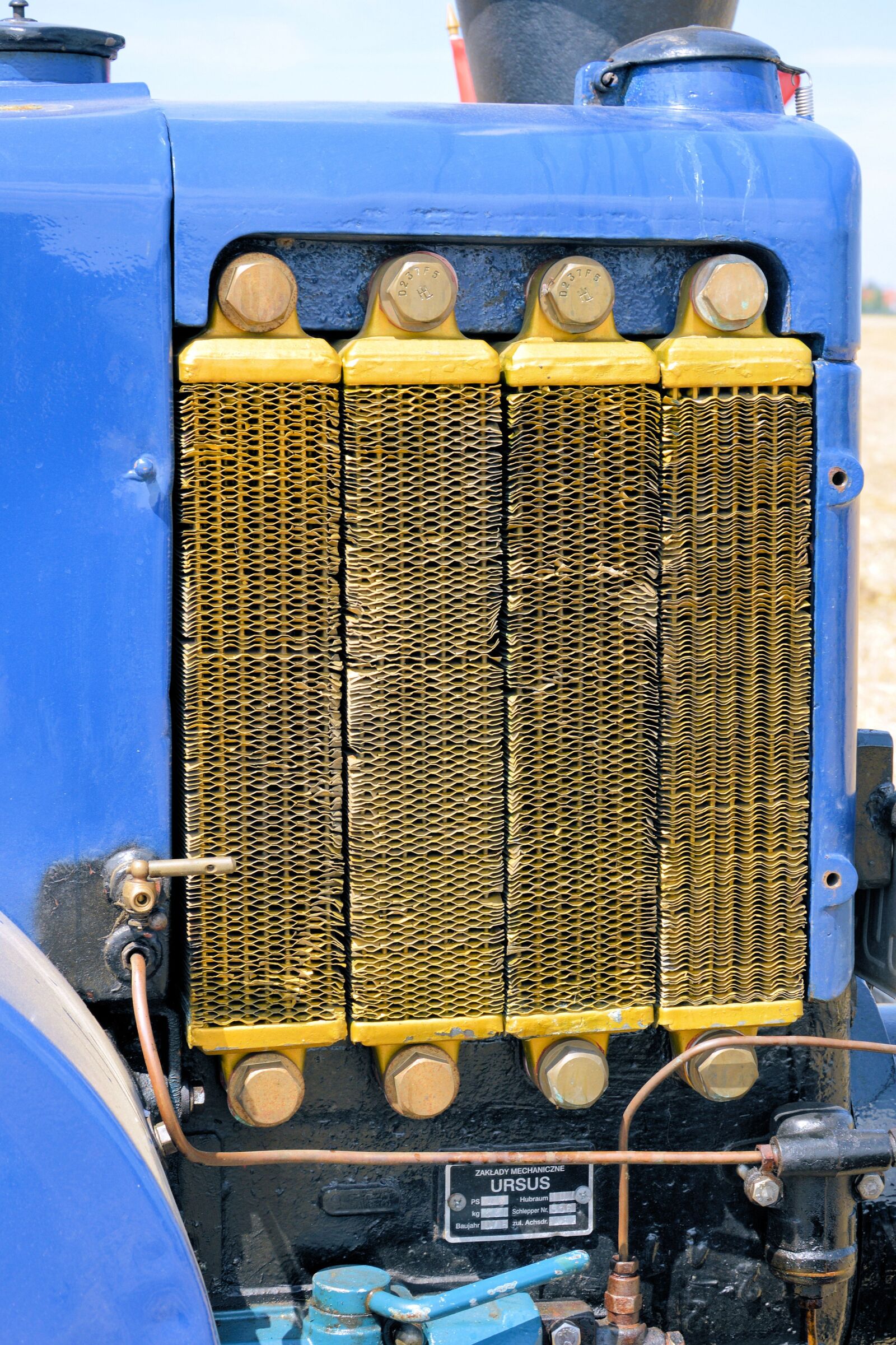 Nikon D3200 sample photo. Oil cooler, tractor, historically photography