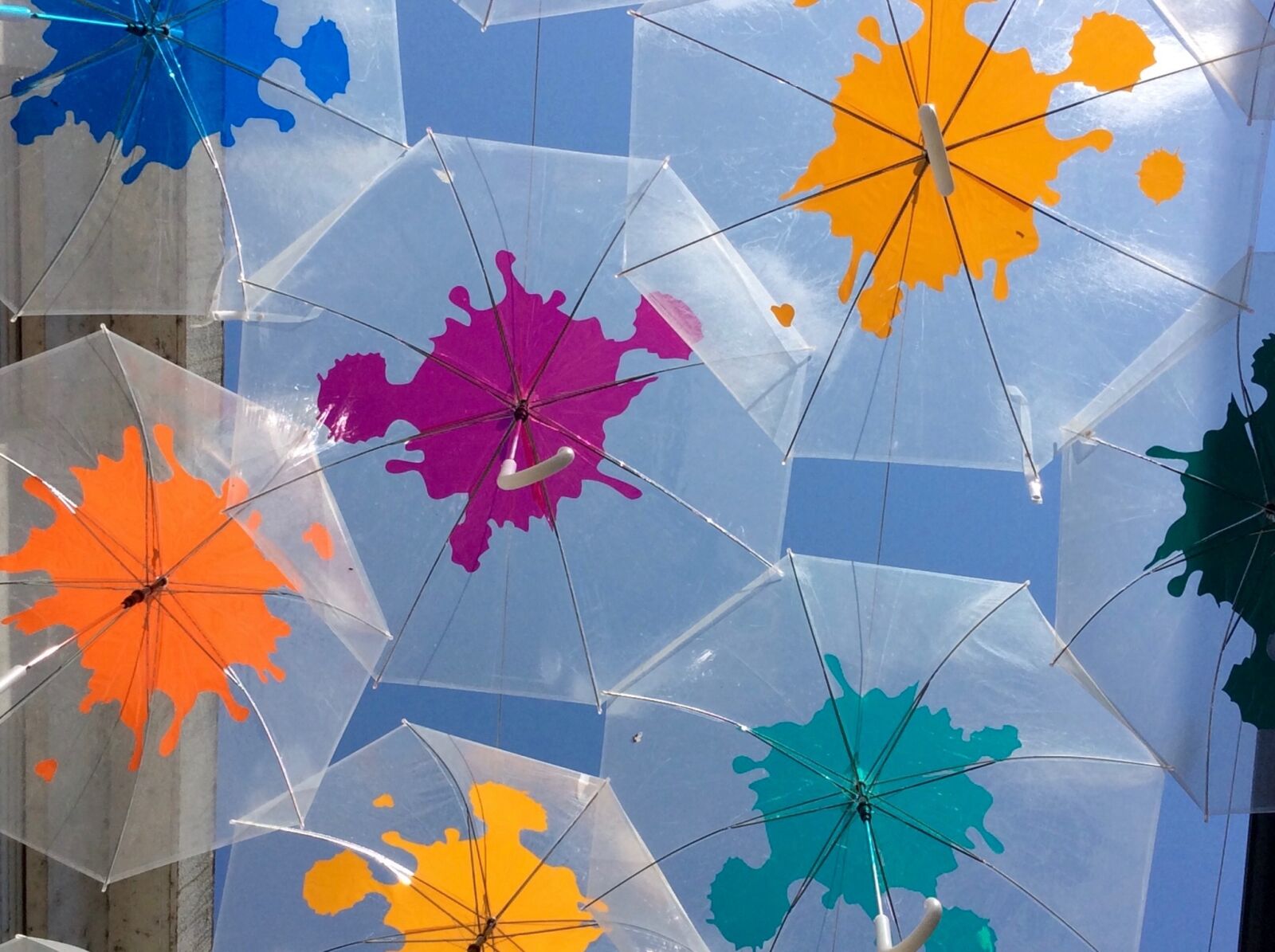 Apple iPad mini 3 sample photo. Umbrella, decorations, street photography