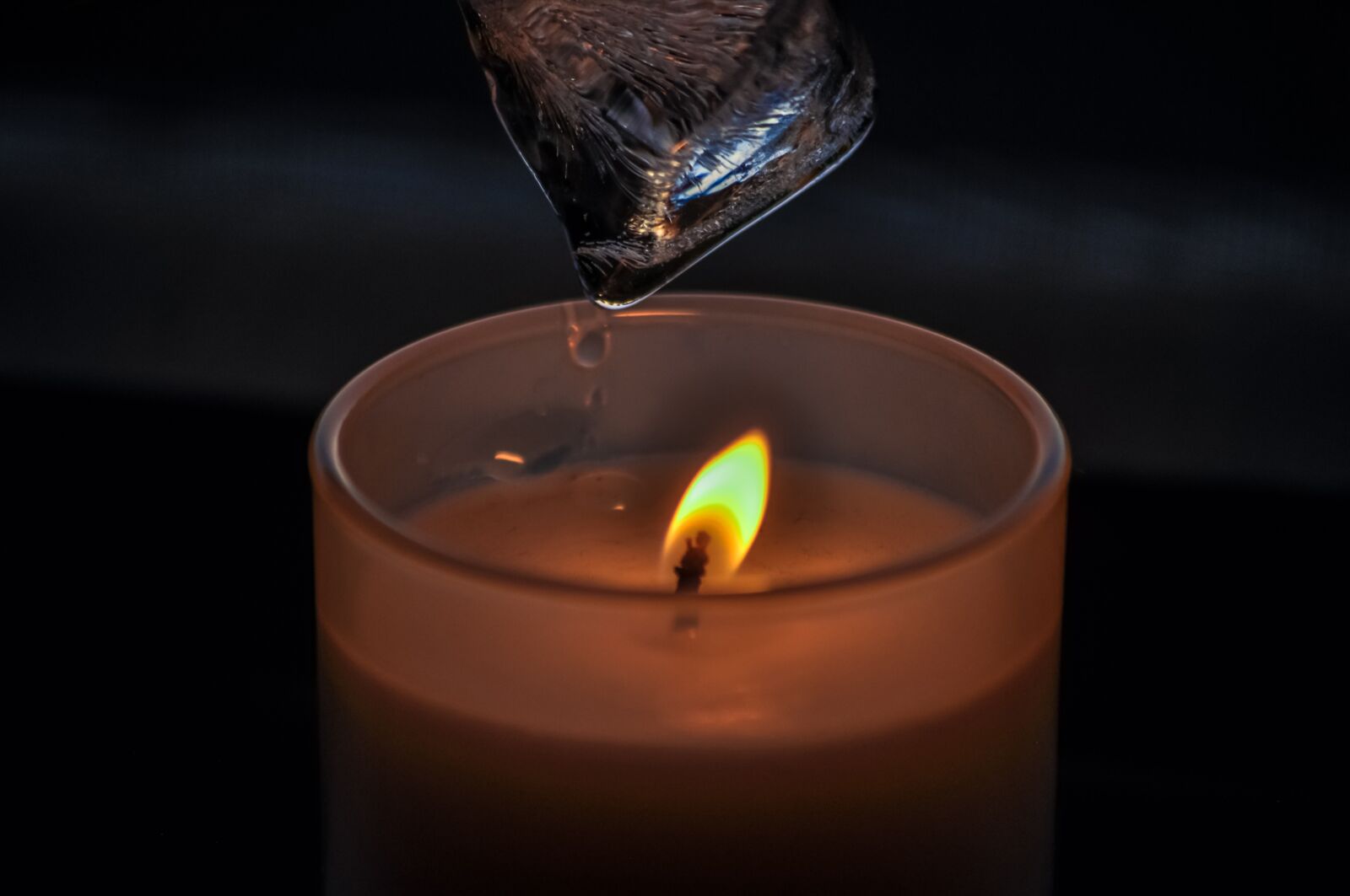 Nikon D90 sample photo. Opposites, fire, candle photography