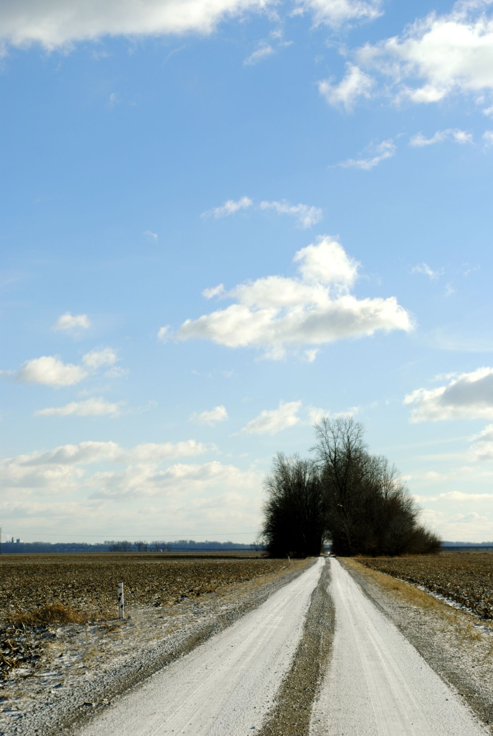 Nikon D3000 sample photo. Gravel road, open space photography
