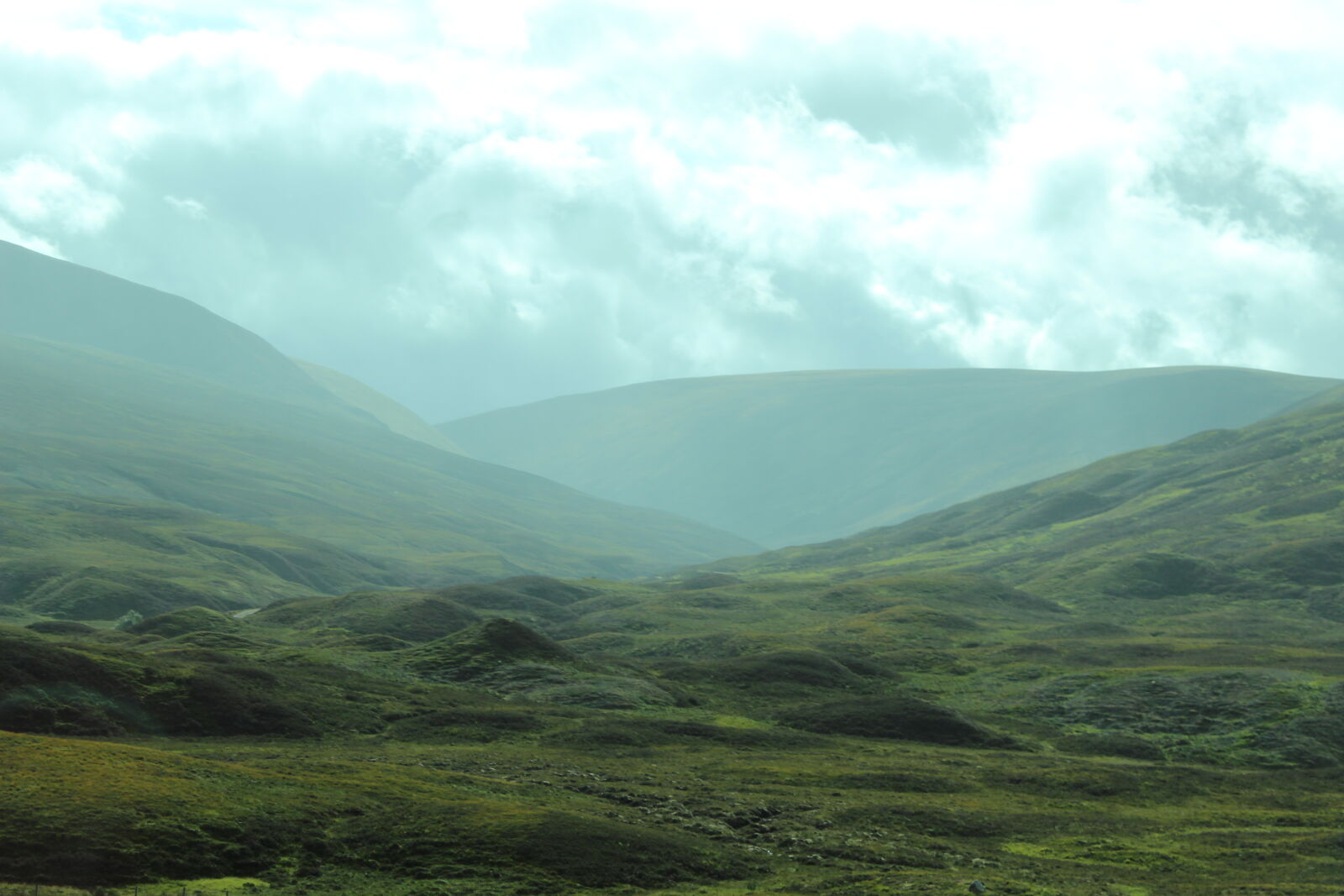 Canon EOS 600D (Rebel EOS T3i / EOS Kiss X5) sample photo. Cloudy, landscape, rolling, hills photography