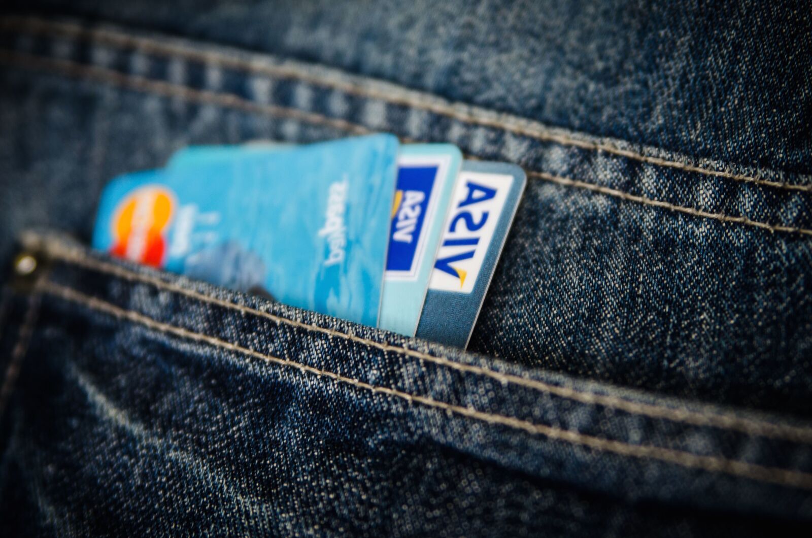 Nikon D5100 sample photo. Jeans, credit card, textile photography