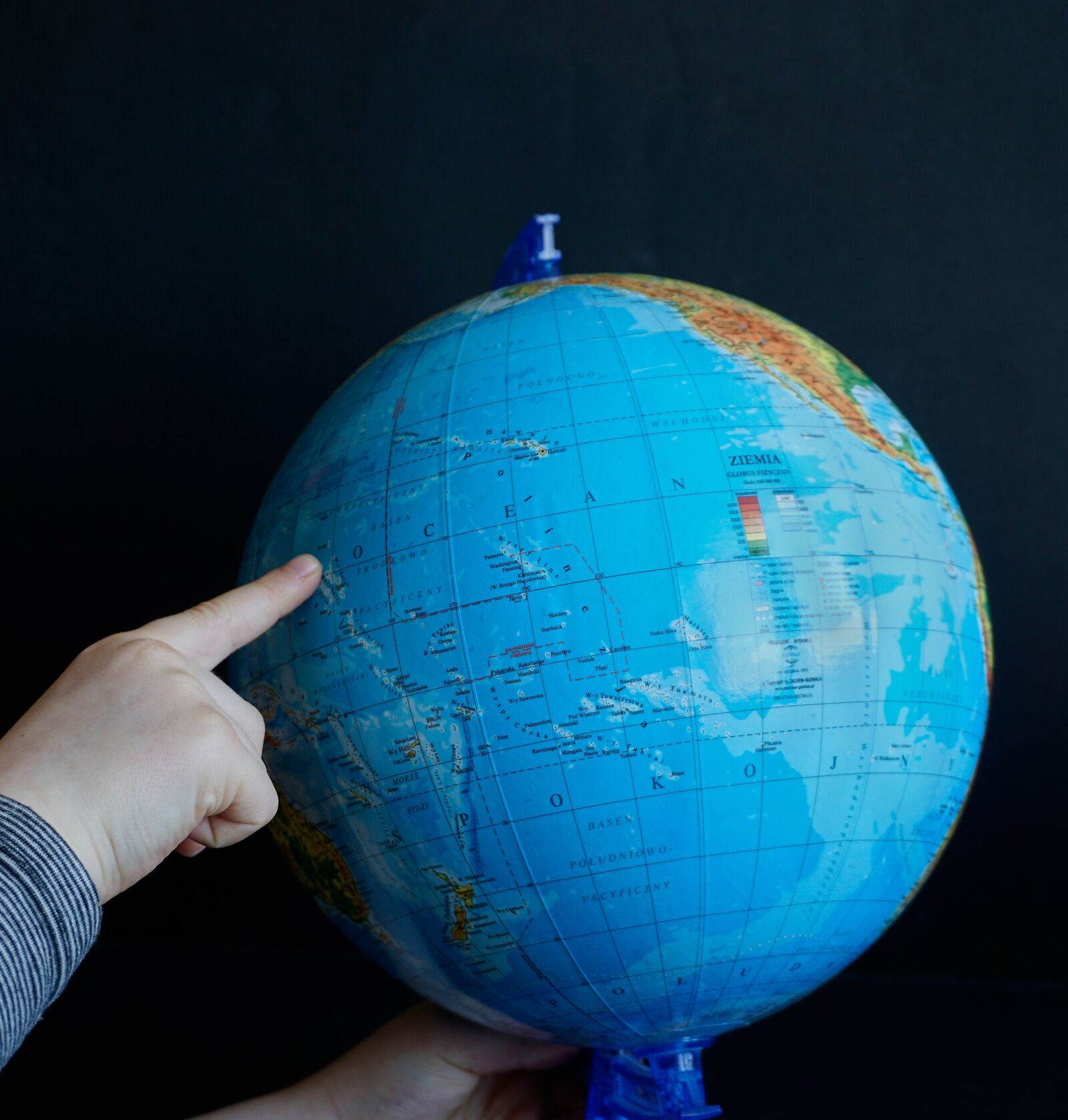 Sony a6000 sample photo. Globus, map, finger photography
