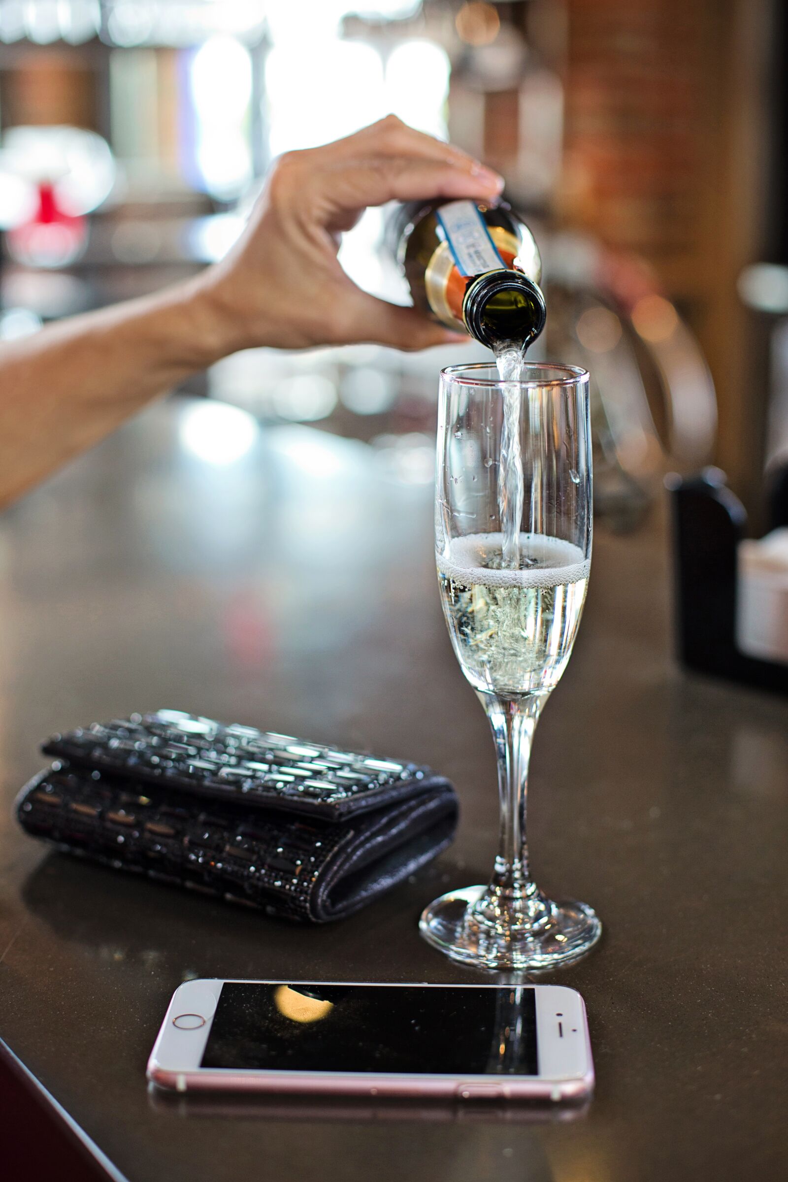 Canon EF 50mm F1.4 USM sample photo. Champagne, white wine, pouring photography