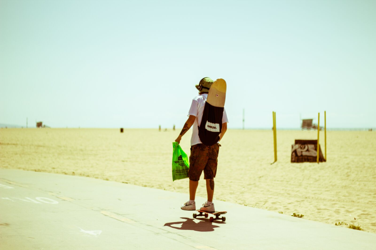 Canon EOS 600D (Rebel EOS T3i / EOS Kiss X5) + Canon EF 50mm F1.8 II sample photo. Beach, california, skateboarding photography