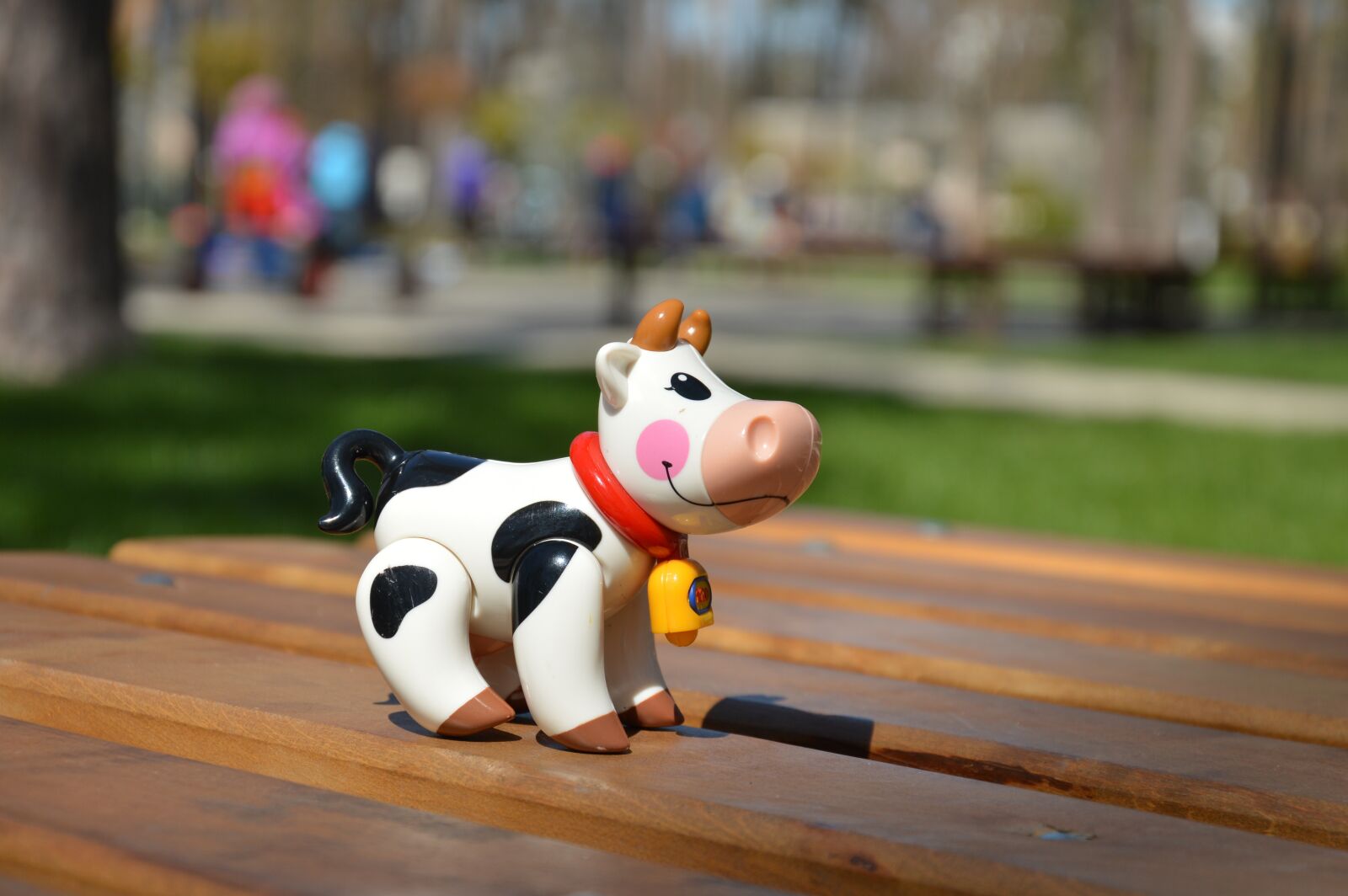 Nikon D3200 sample photo. Cow, toy, bokeh photography