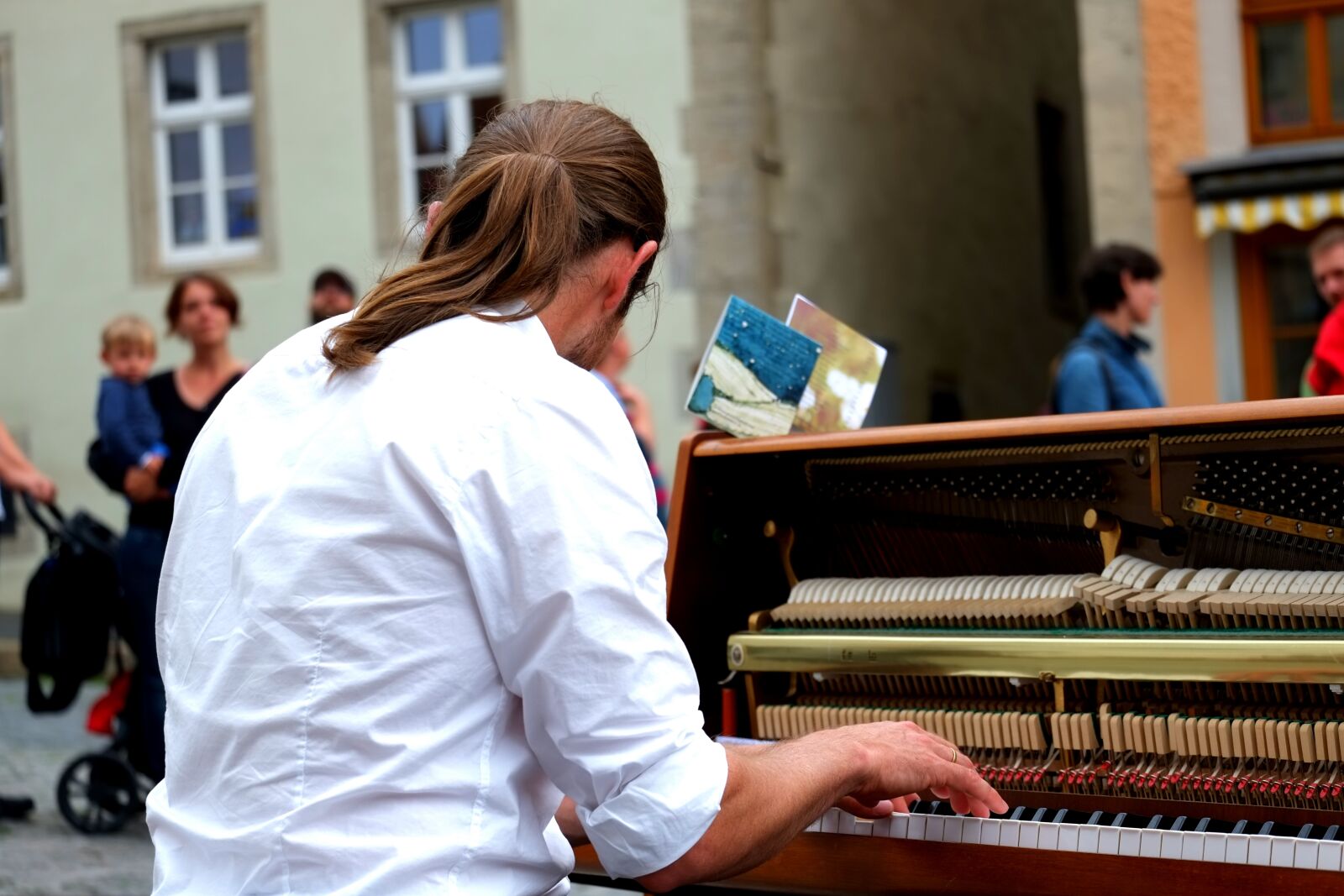 Fujifilm X-E1 sample photo. Piano player, musician, focused photography