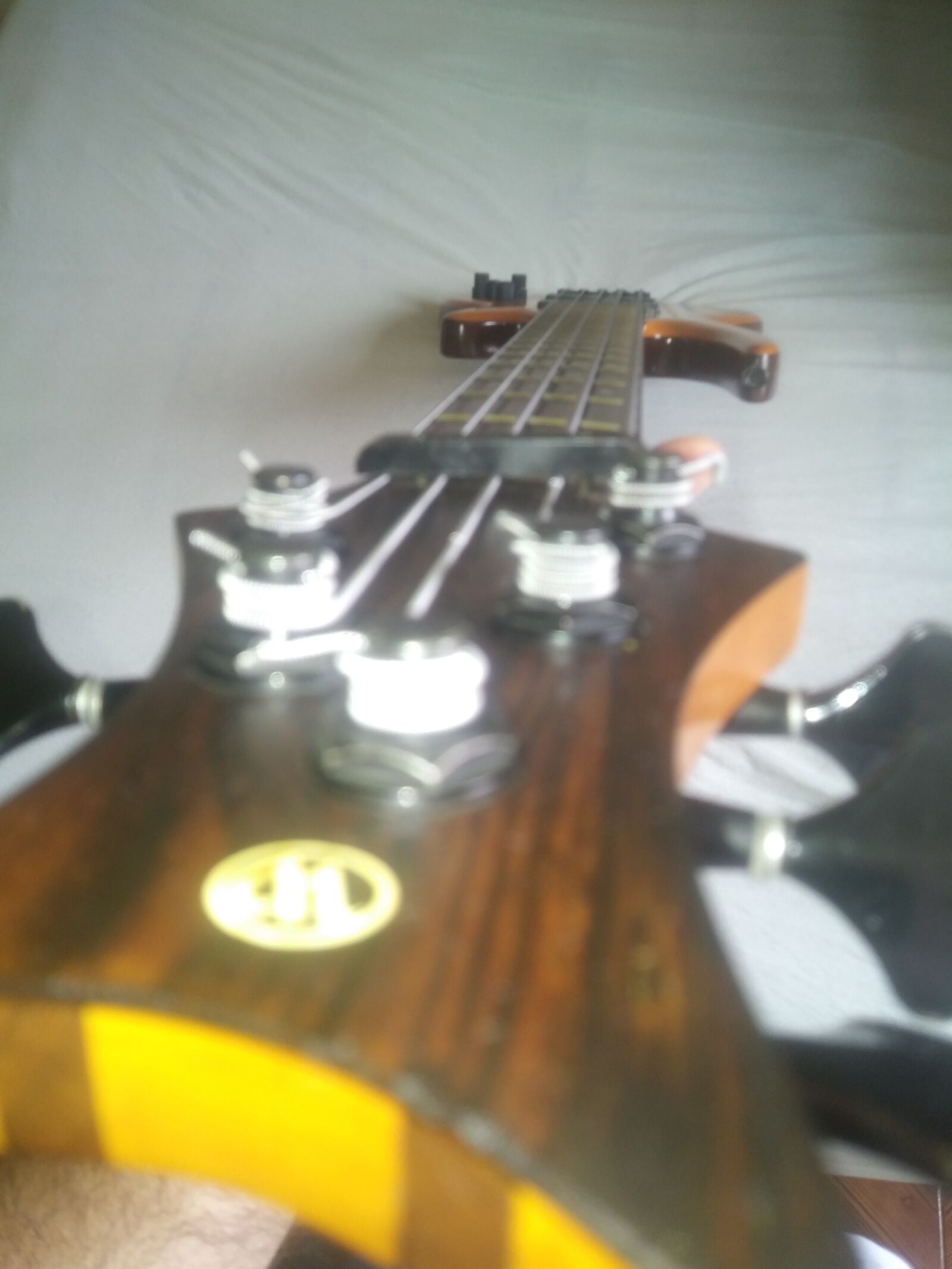 LG Q6 sample photo. Bass, yellow, wood photography