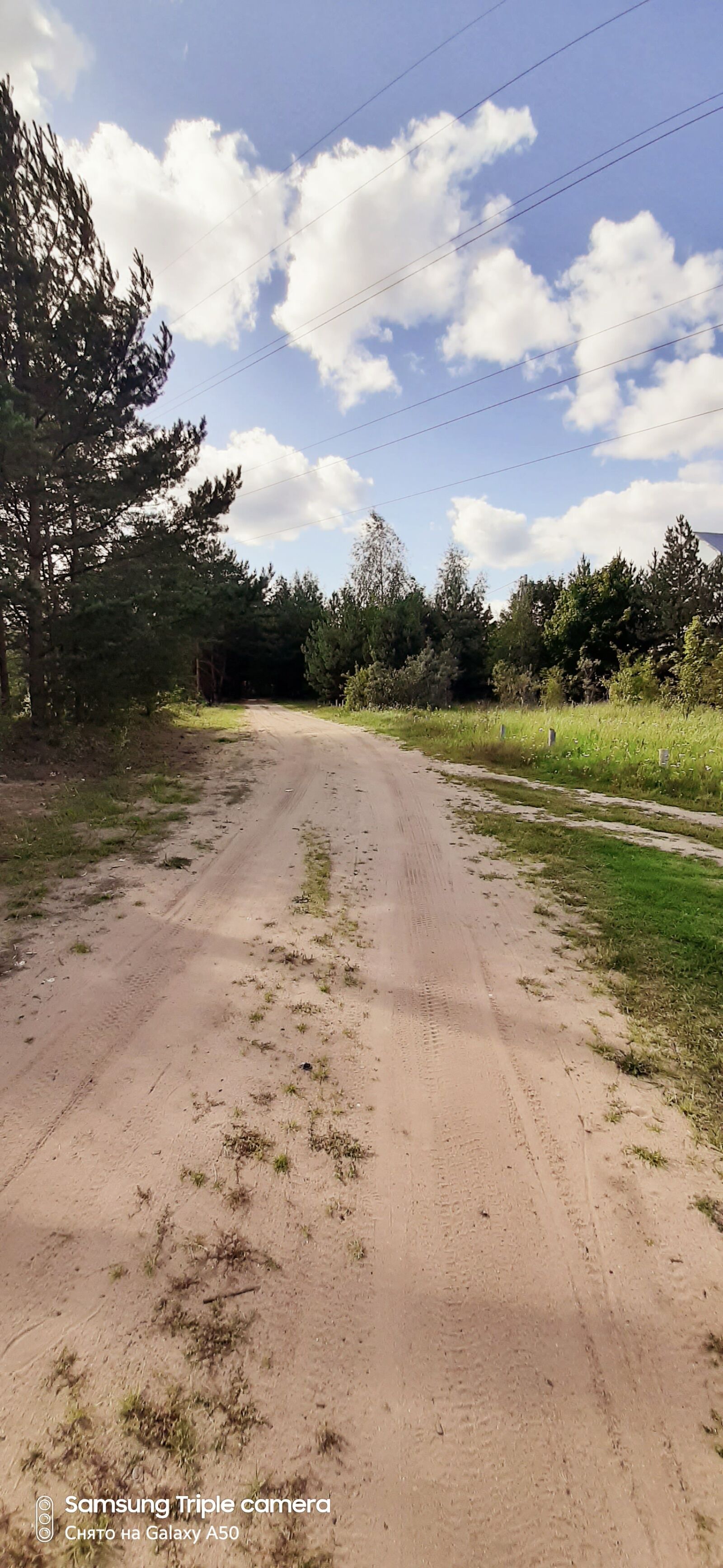 Samsung Galaxy A50 sample photo. Road, sky, clouds photography