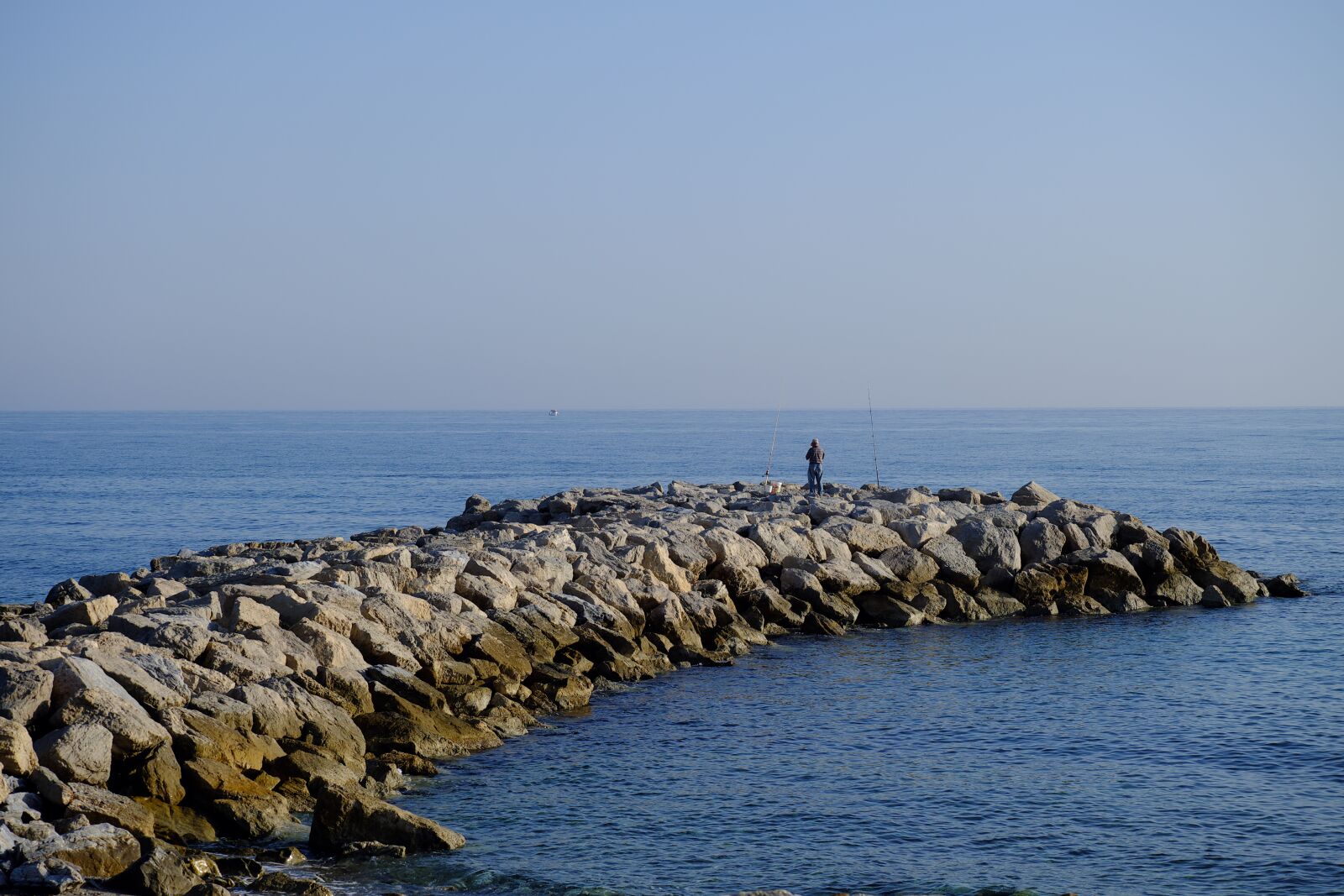 Fujifilm X-A2 + Fujifilm XC 50-230mm F4.5-6.7 OIS II sample photo. Man, fishing, fish photography