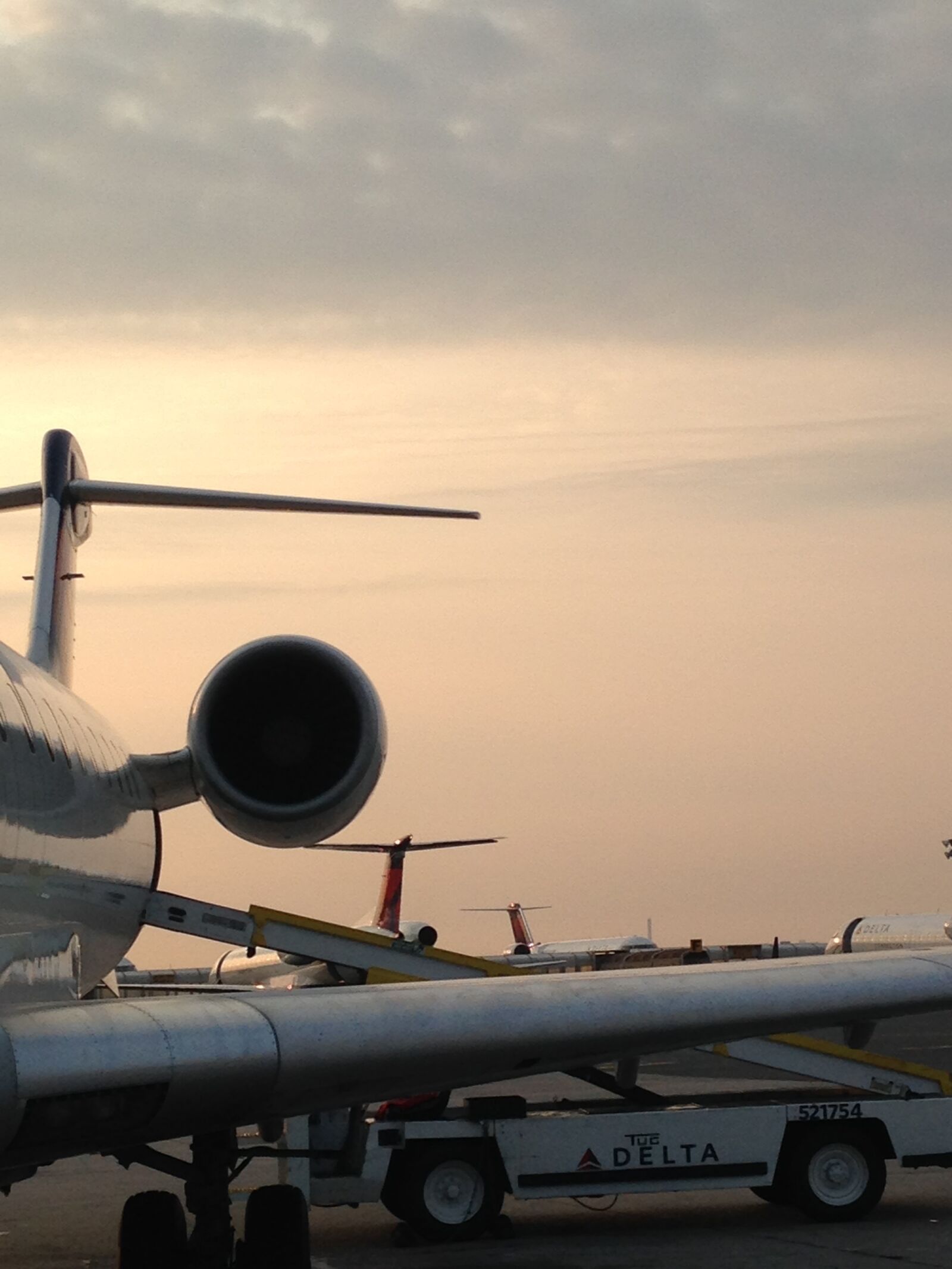 iPhone 5 back camera 4.12mm f/2.4 sample photo. Airplane, jet engine, wing photography
