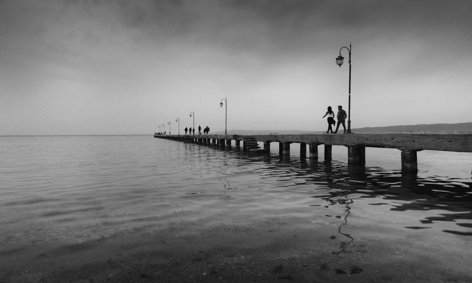 Tokina AT-X Pro 11-16mm F2.8 DX II sample photo. Peer, people, black photography