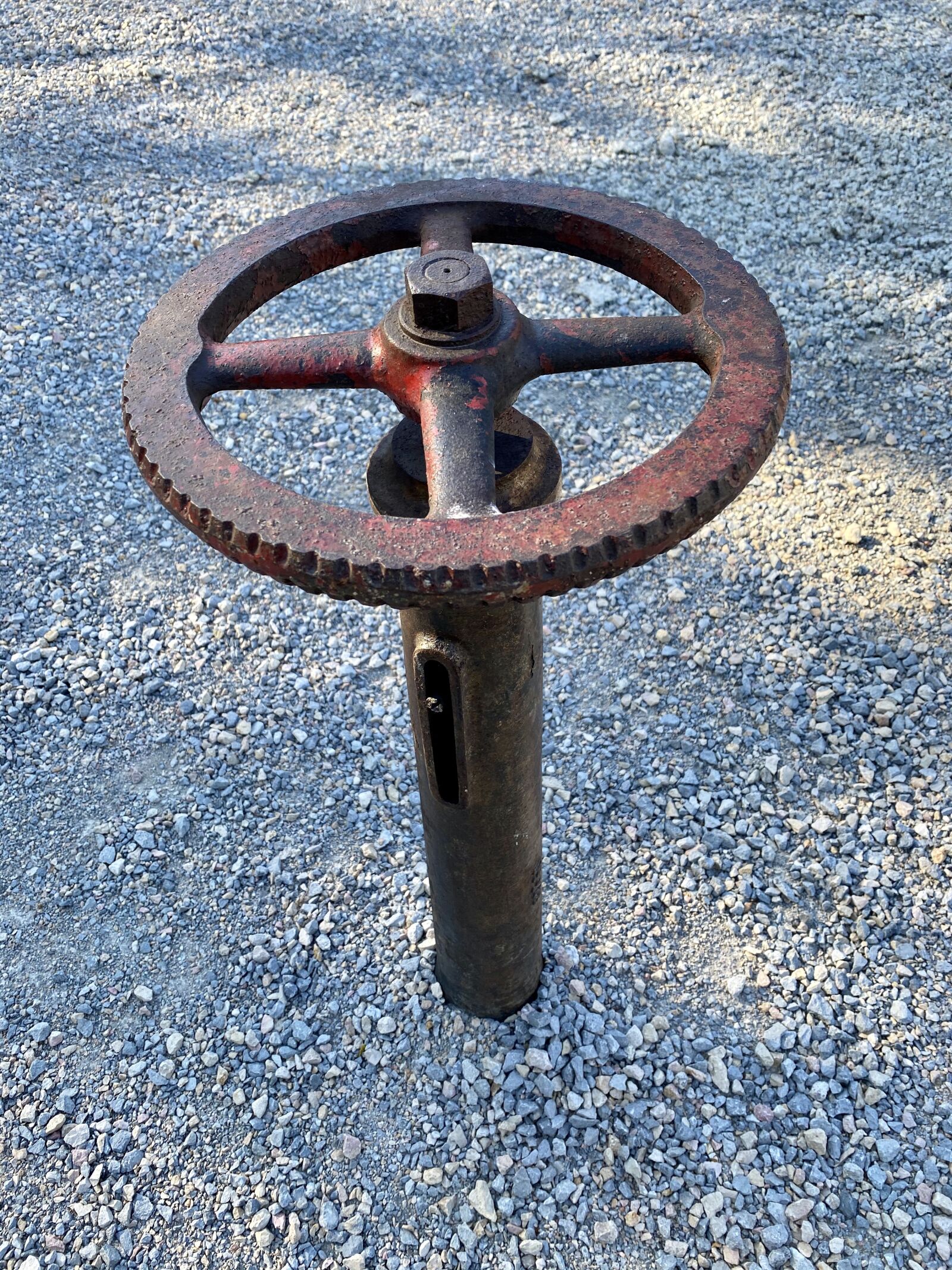 Apple iPhone 11 Pro sample photo. Wheel, cog, rusty photography