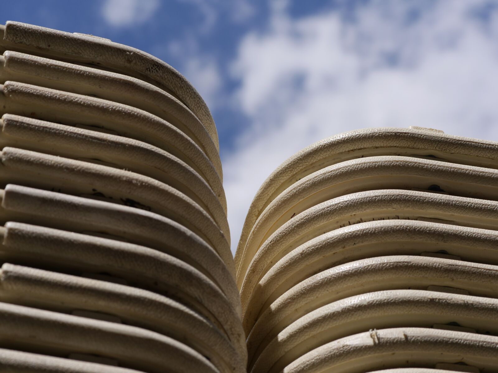 Panasonic Lumix DMC-GH3 sample photo. Stack of chairs, stack photography