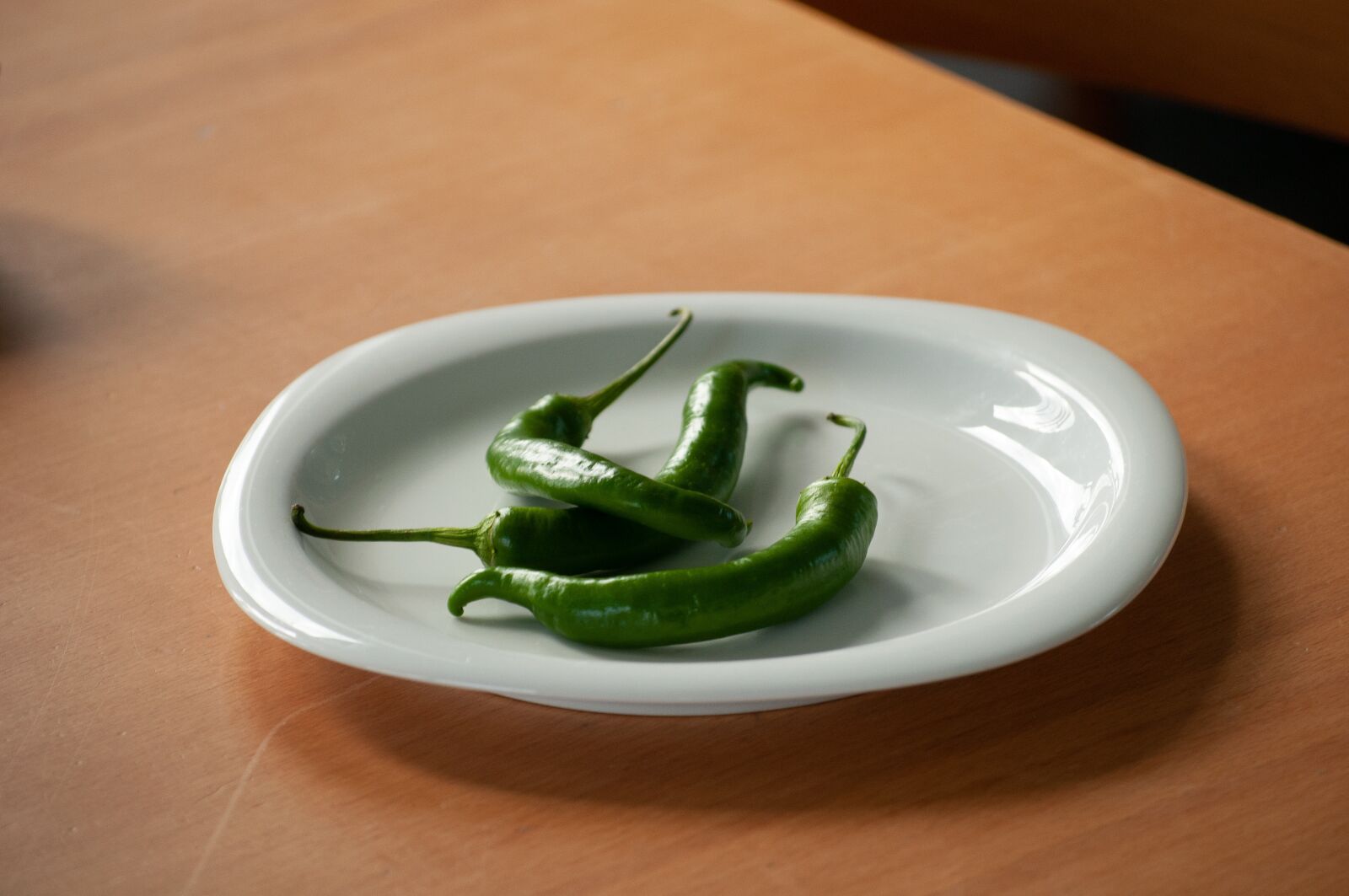 Nikon D300 sample photo. Chilli pepper, green, plate photography