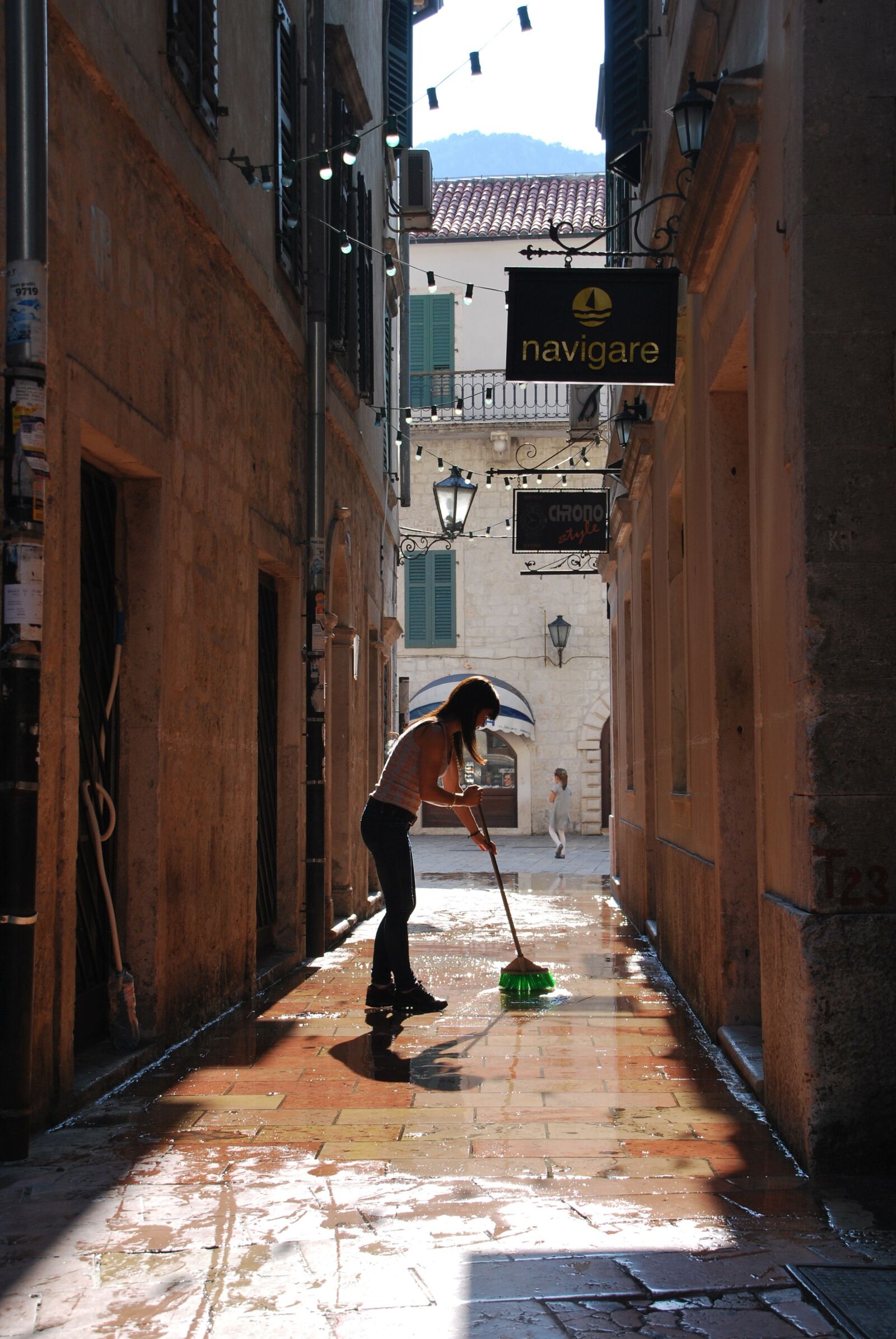 Nikon D60 sample photo. Woman, cleaning, sweeping photography