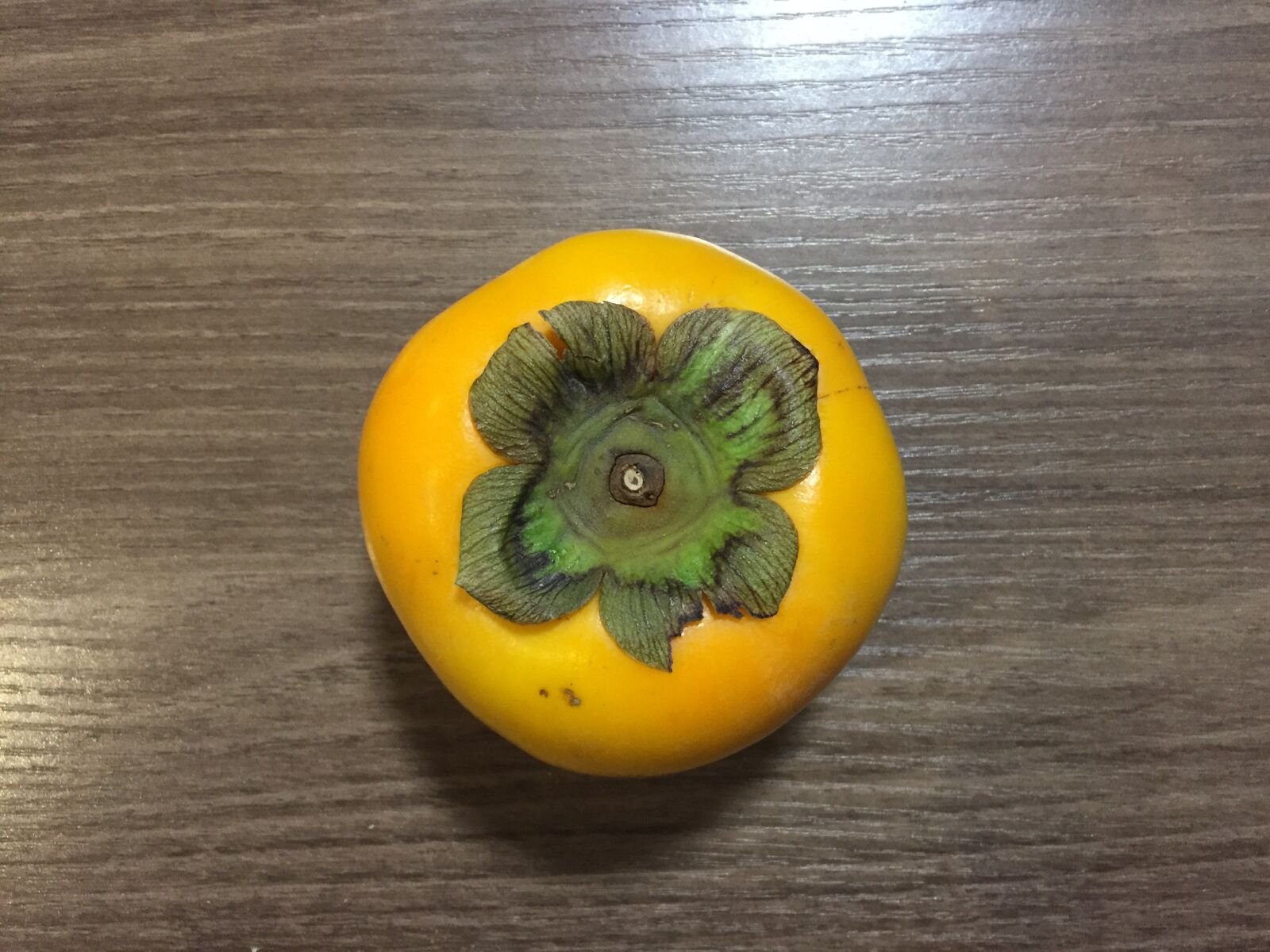 iPhone 6 back camera 4.15mm f/2.2 sample photo. Fruit, persimon, juice photography
