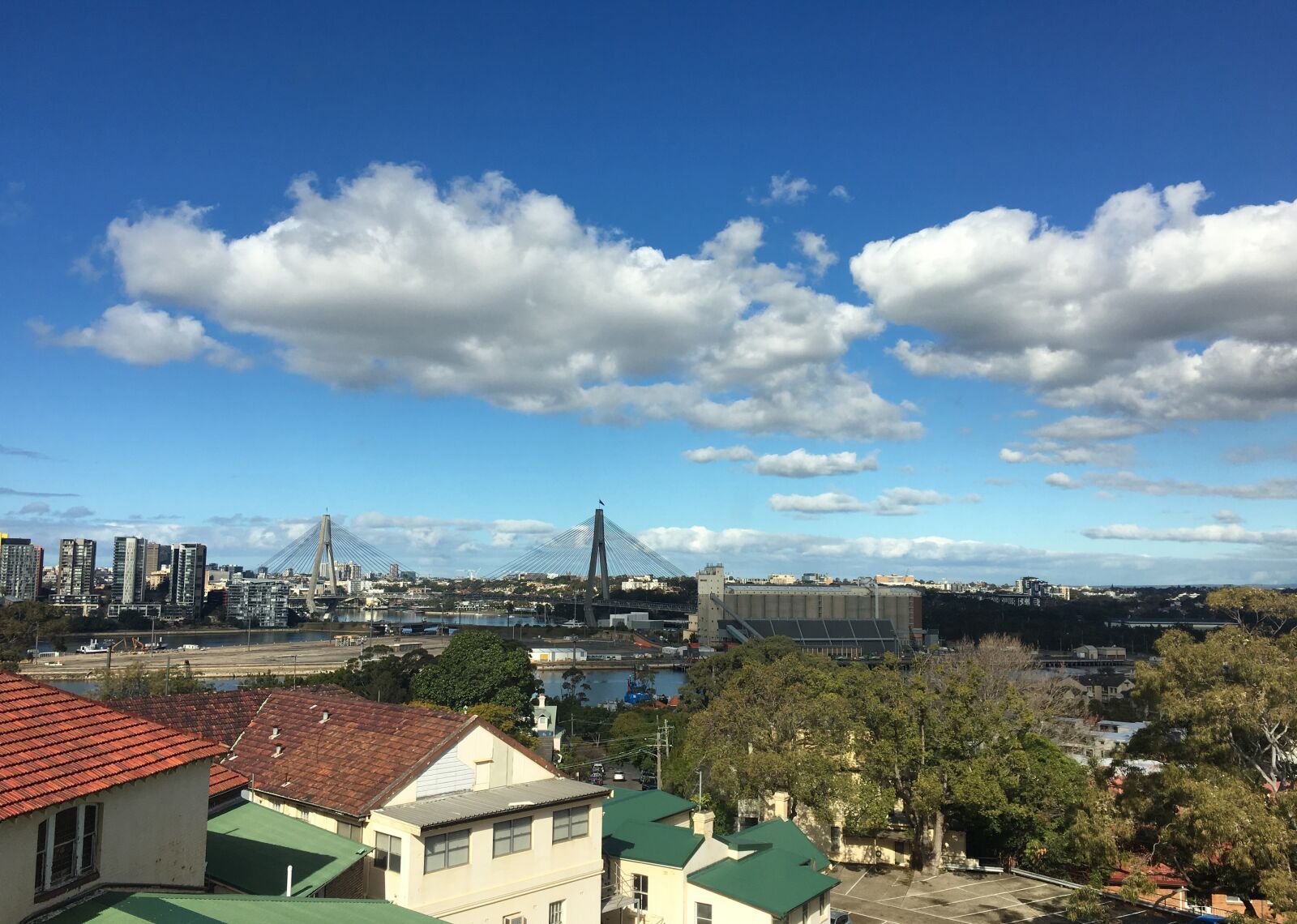 Apple iPhone 6s sample photo. Blue sky, town, city photography