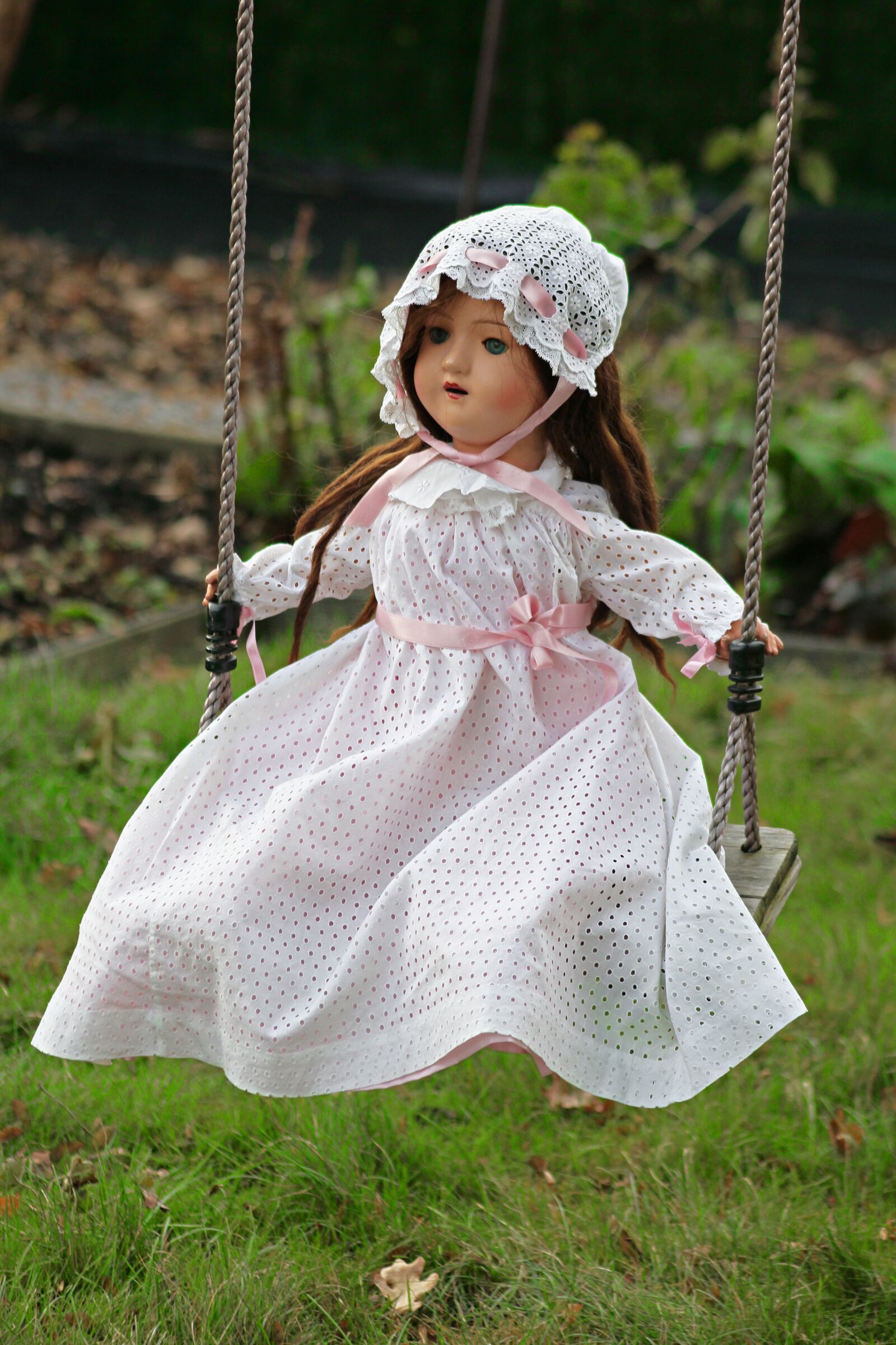 Canon EF 75-300mm f/4-5.6 USM sample photo. Doll, swing, toy photography