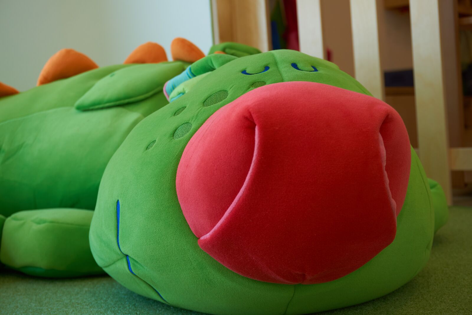 Sony a6000 sample photo. Stuffed animal, dragon, seat photography