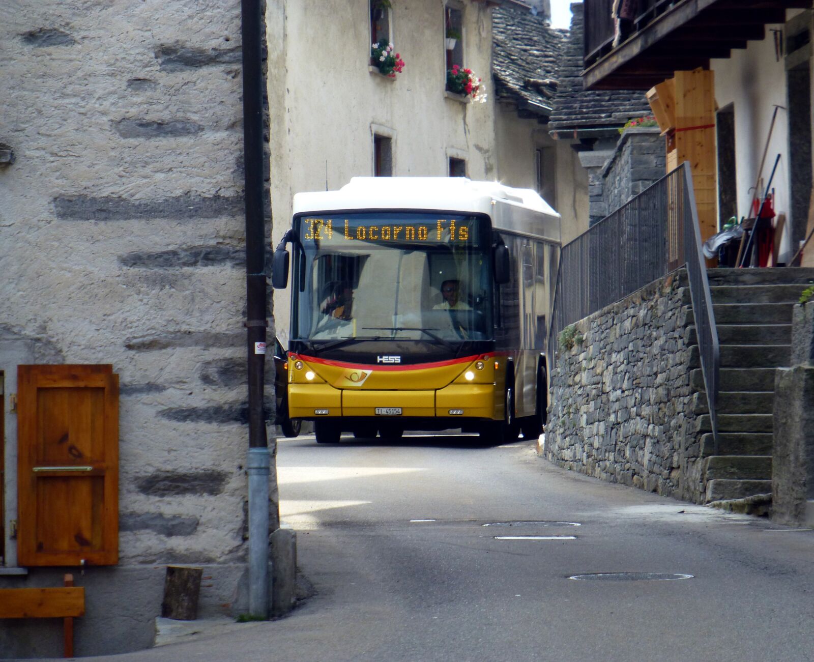 Panasonic DMC-TZ31 sample photo. Swiss postbus, village, narrow photography