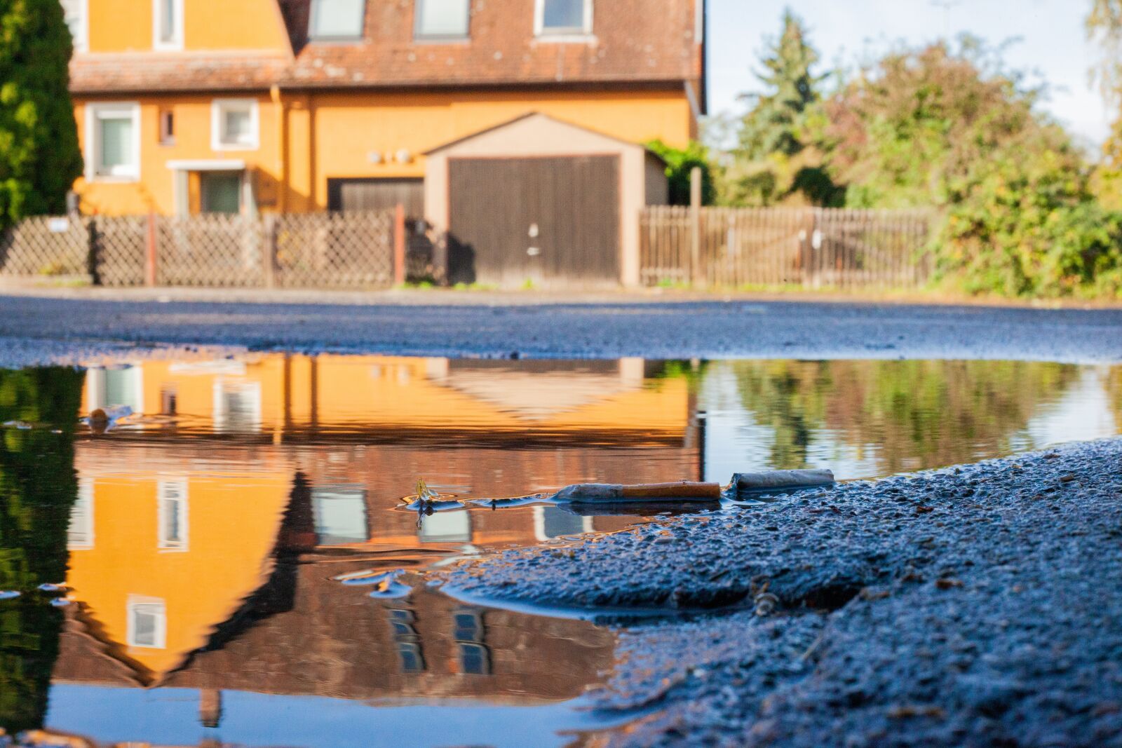Canon EF 50mm F1.8 II sample photo. Reflection, asphalt, house photography