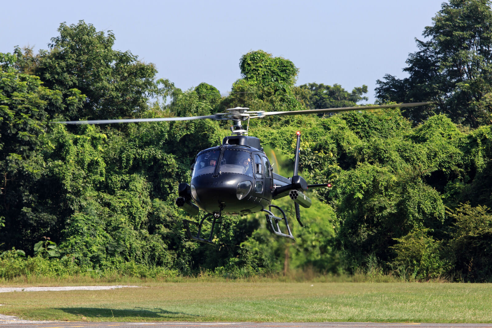 Canon EF 100-400mm F4.5-5.6L IS USM sample photo. Black, helicopter, over, the photography