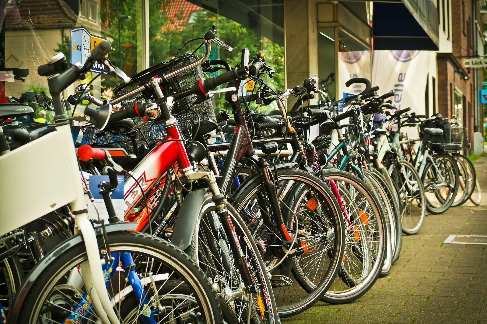 Olympus OM-D E-M10 sample photo. Bicycles, business, urban photography