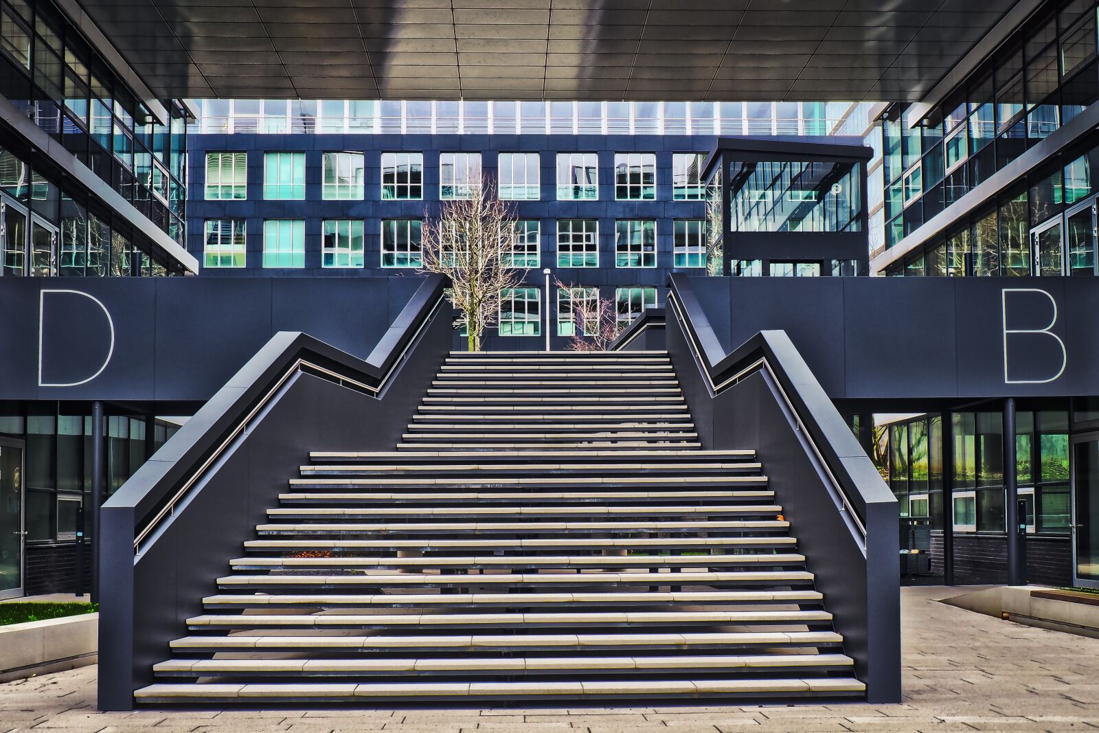 Olympus OM-D E-M10 sample photo. Architecture, glass, modern photography