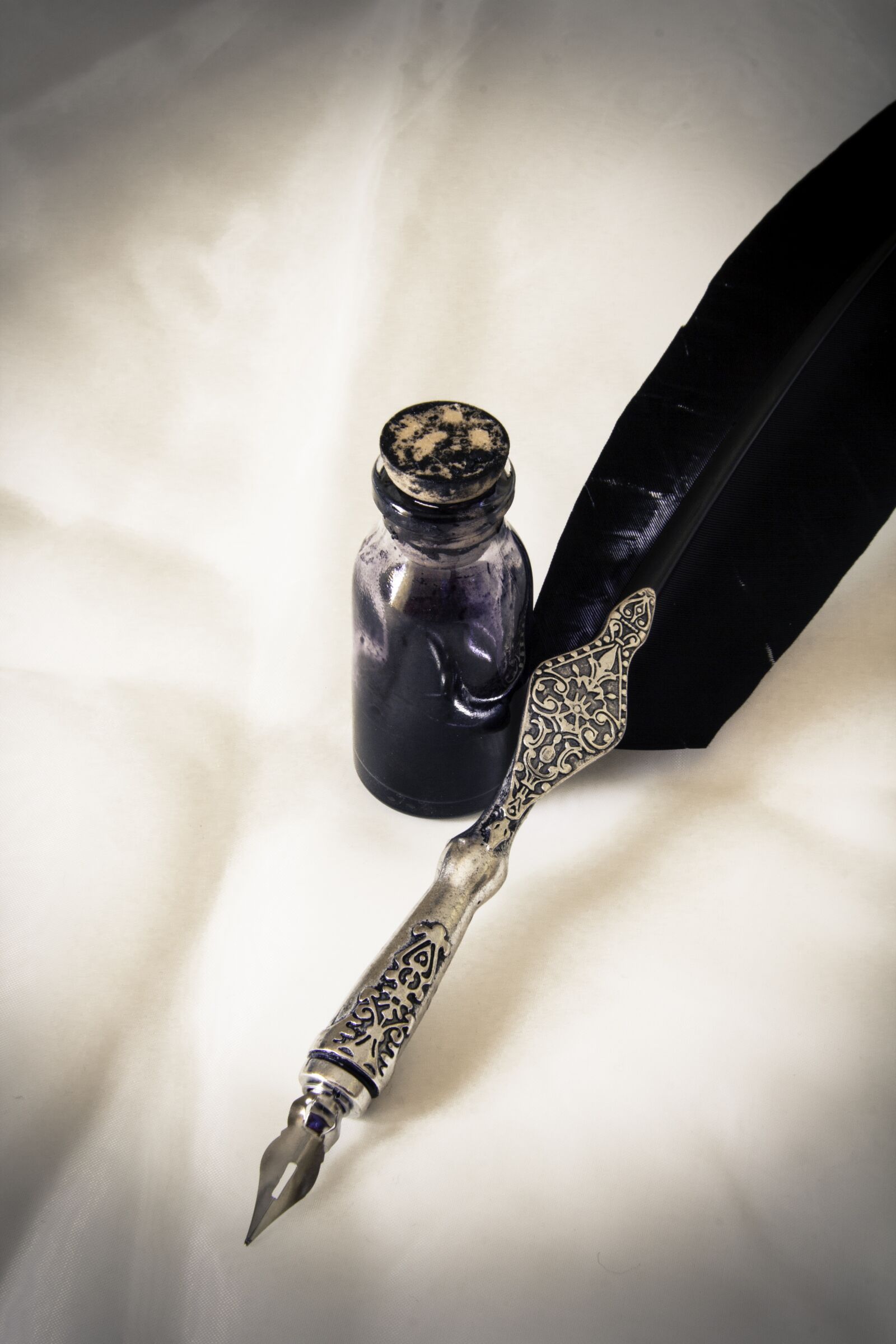 Canon EF-S 17-85mm F4-5.6 IS USM sample photo. Quill pen, ink, feather photography
