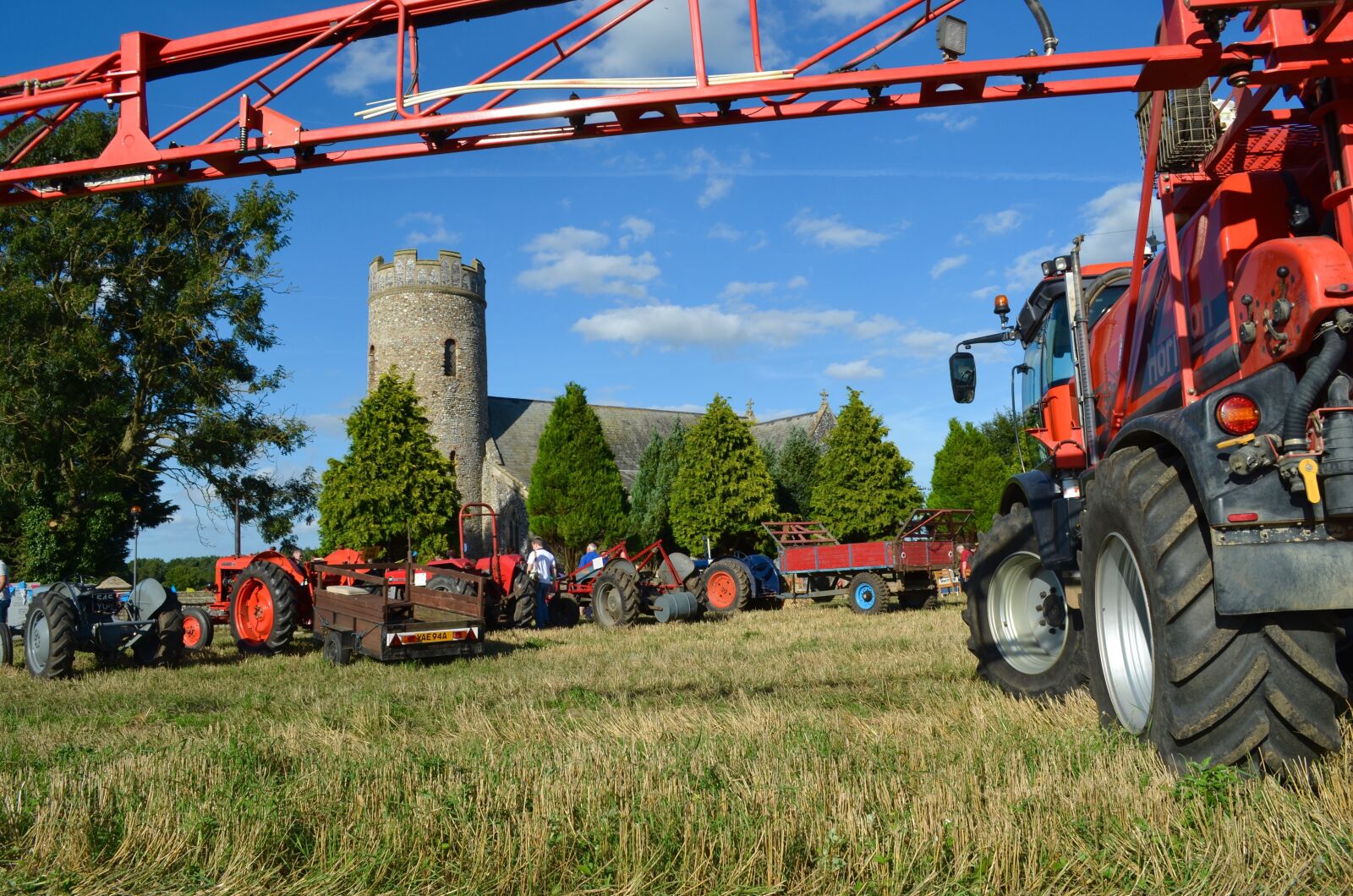 Nikon D5100 sample photo. Crop sprayer, church, harvest photography