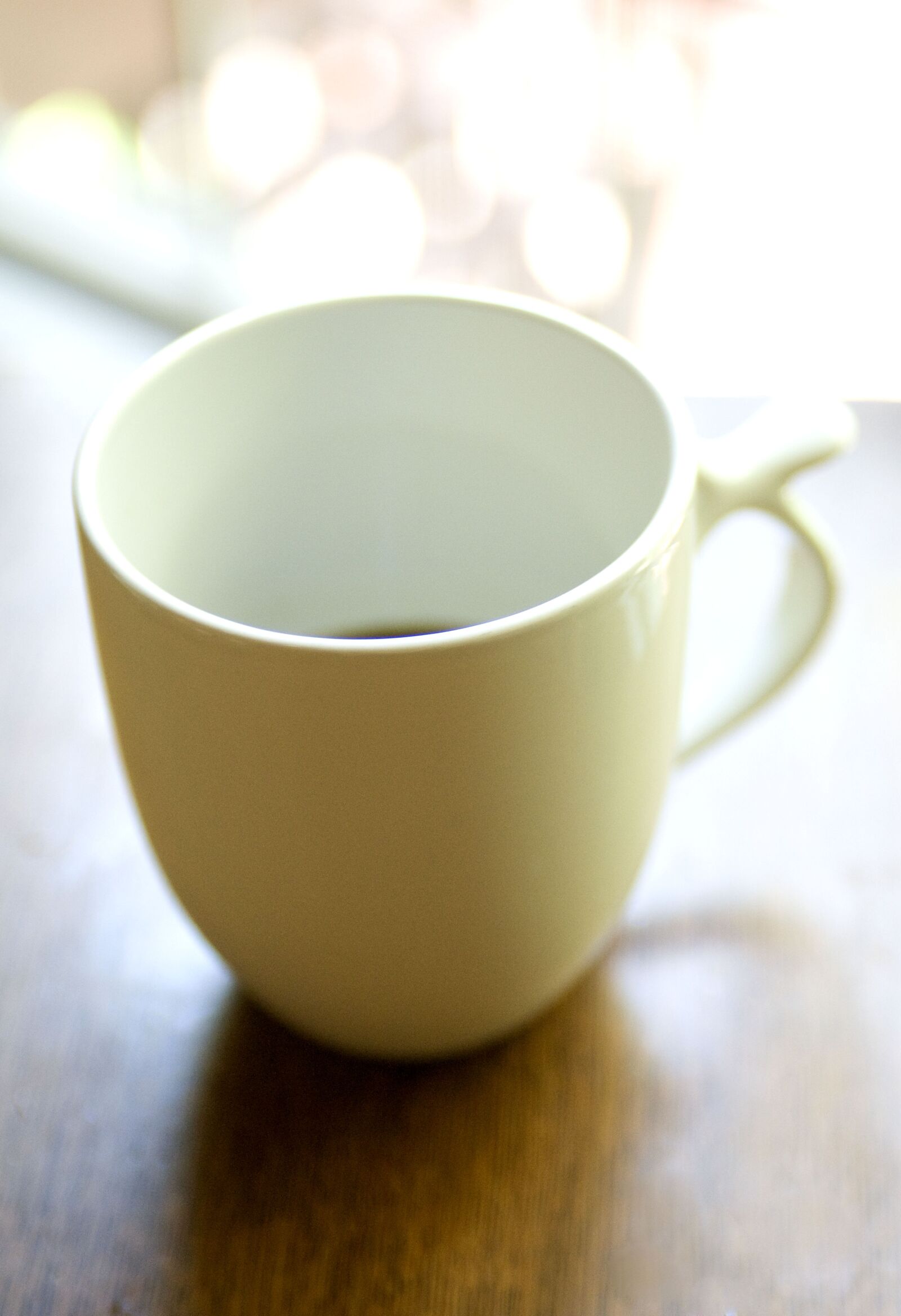 Nikon D300 sample photo. Filled, white, ceramic, cup photography