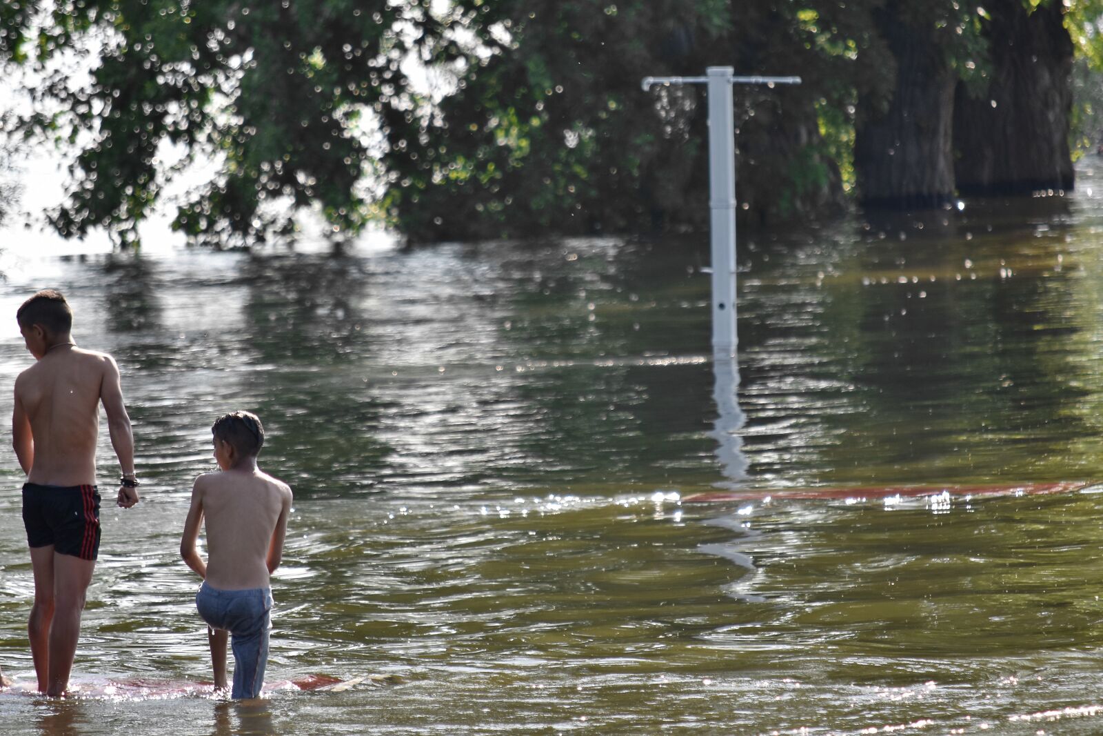 Nikon D5500 sample photo. Boys, flood, landscape, recreation photography