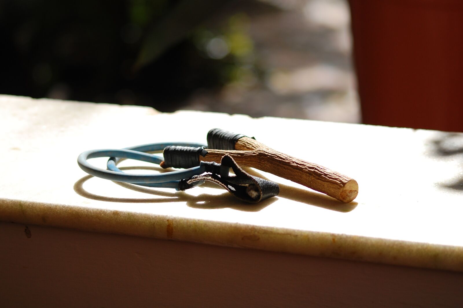 Nikon D40 sample photo. Hunting, slingshot, childhood photography