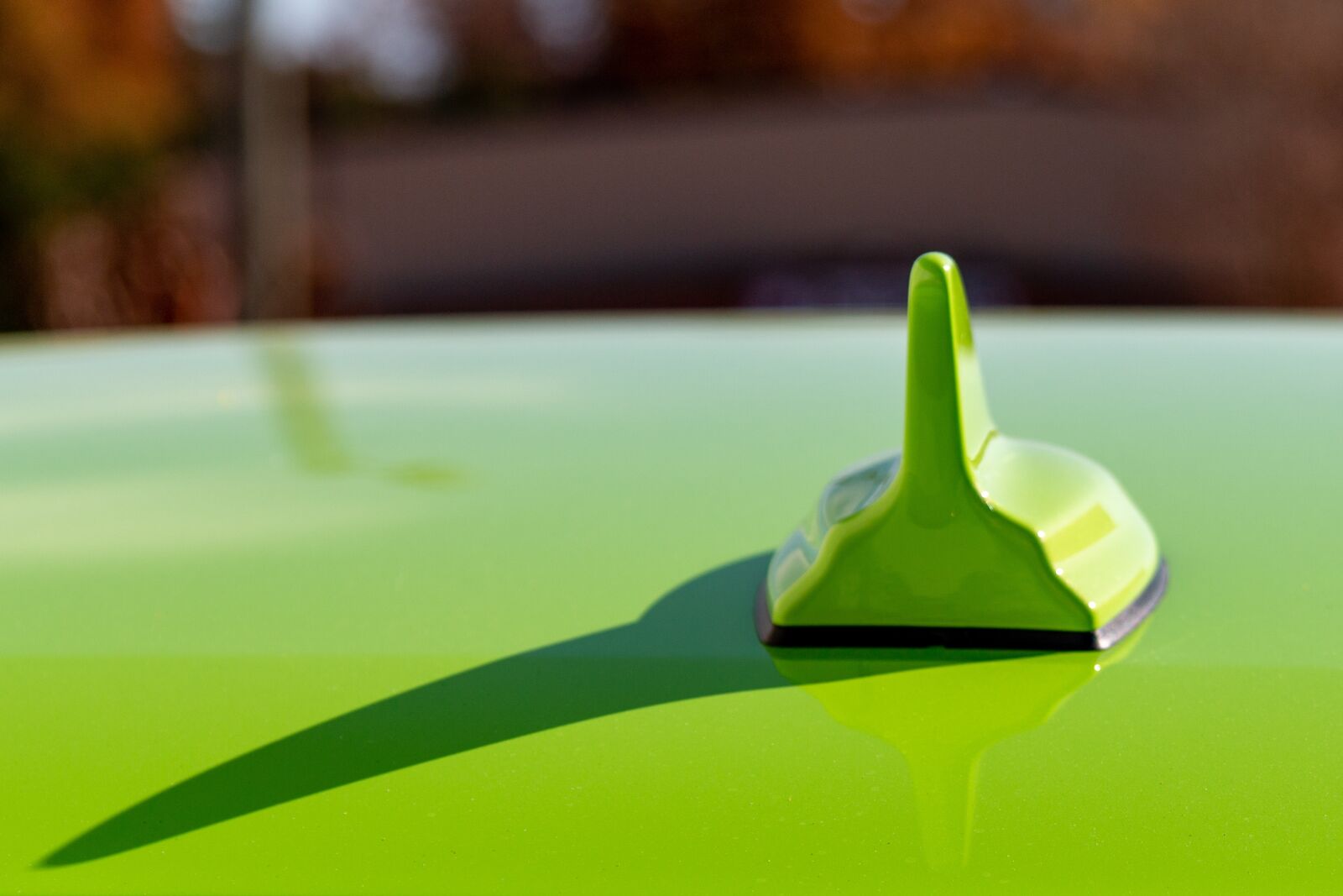 Canon EF-S 17-85mm F4-5.6 IS USM sample photo. Antenna, green, car photography