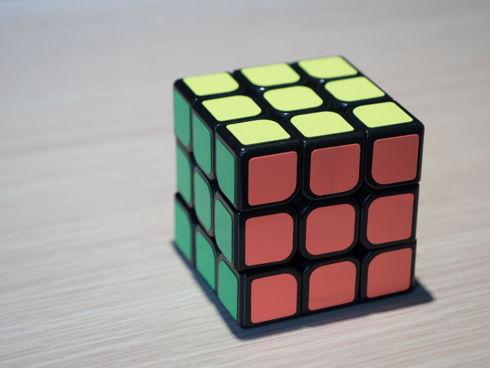 LEICA DG 12-60/F2.8-4.0 sample photo. Rubik's cube, cube, yellow photography