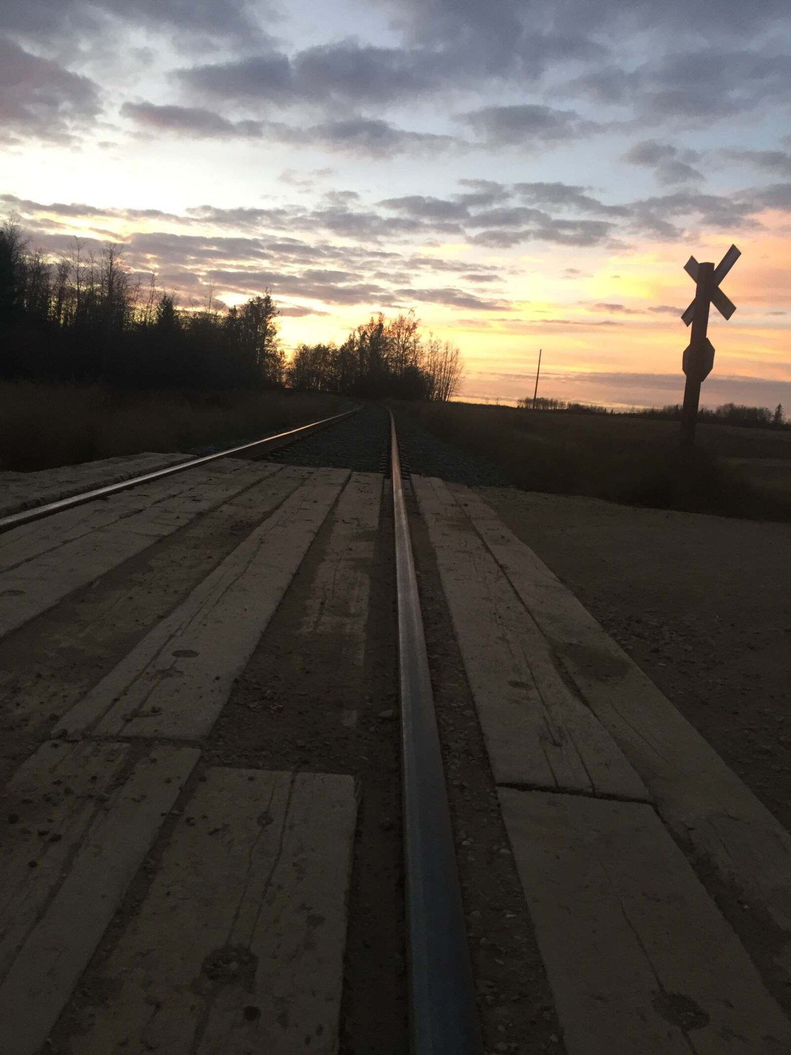 iPhone 6 back camera 4.15mm f/2.2 sample photo. Clouds, photograph, railroad, tracks photography