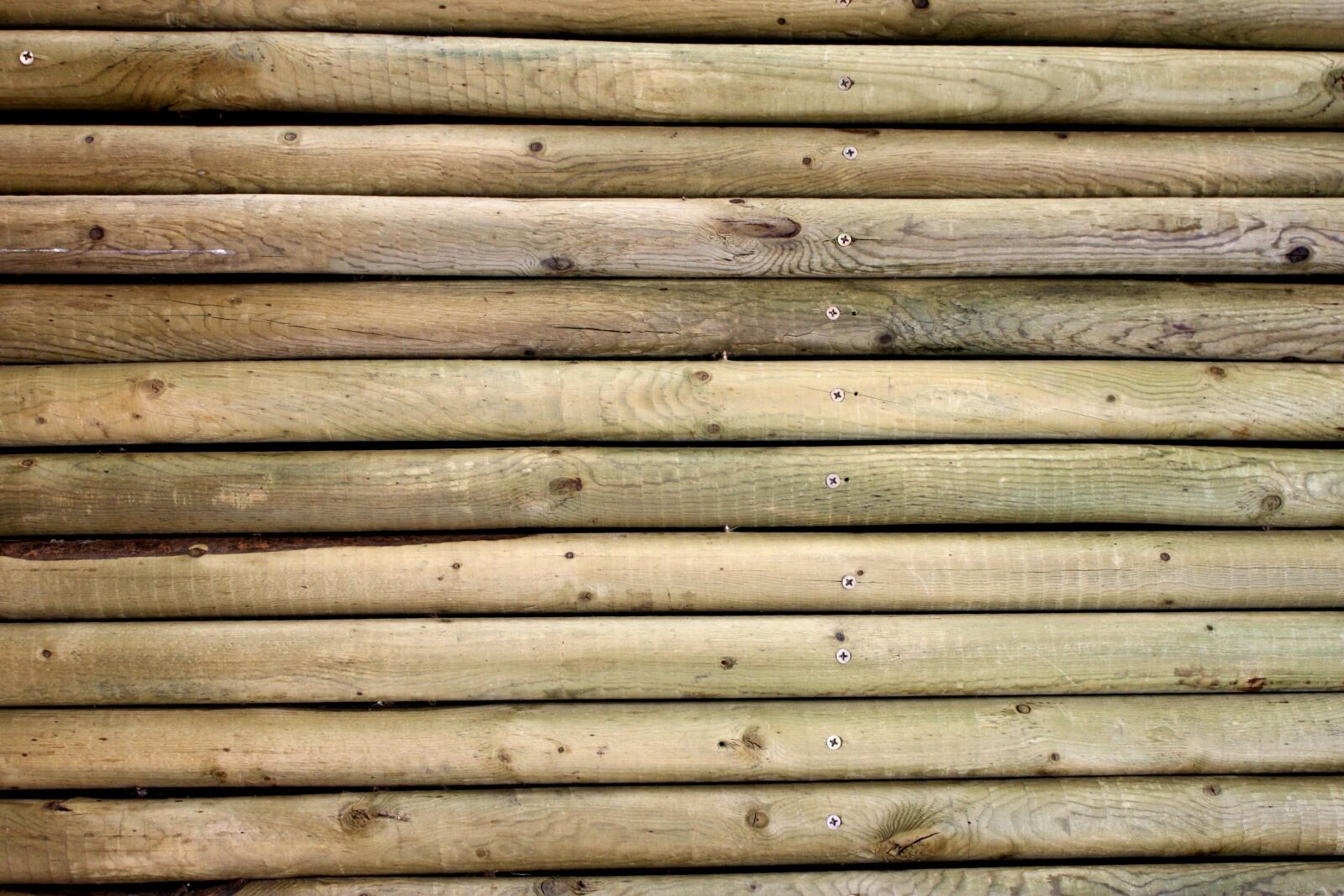 f/3.5-5.6 IS sample photo. Wooden poles, texture photography