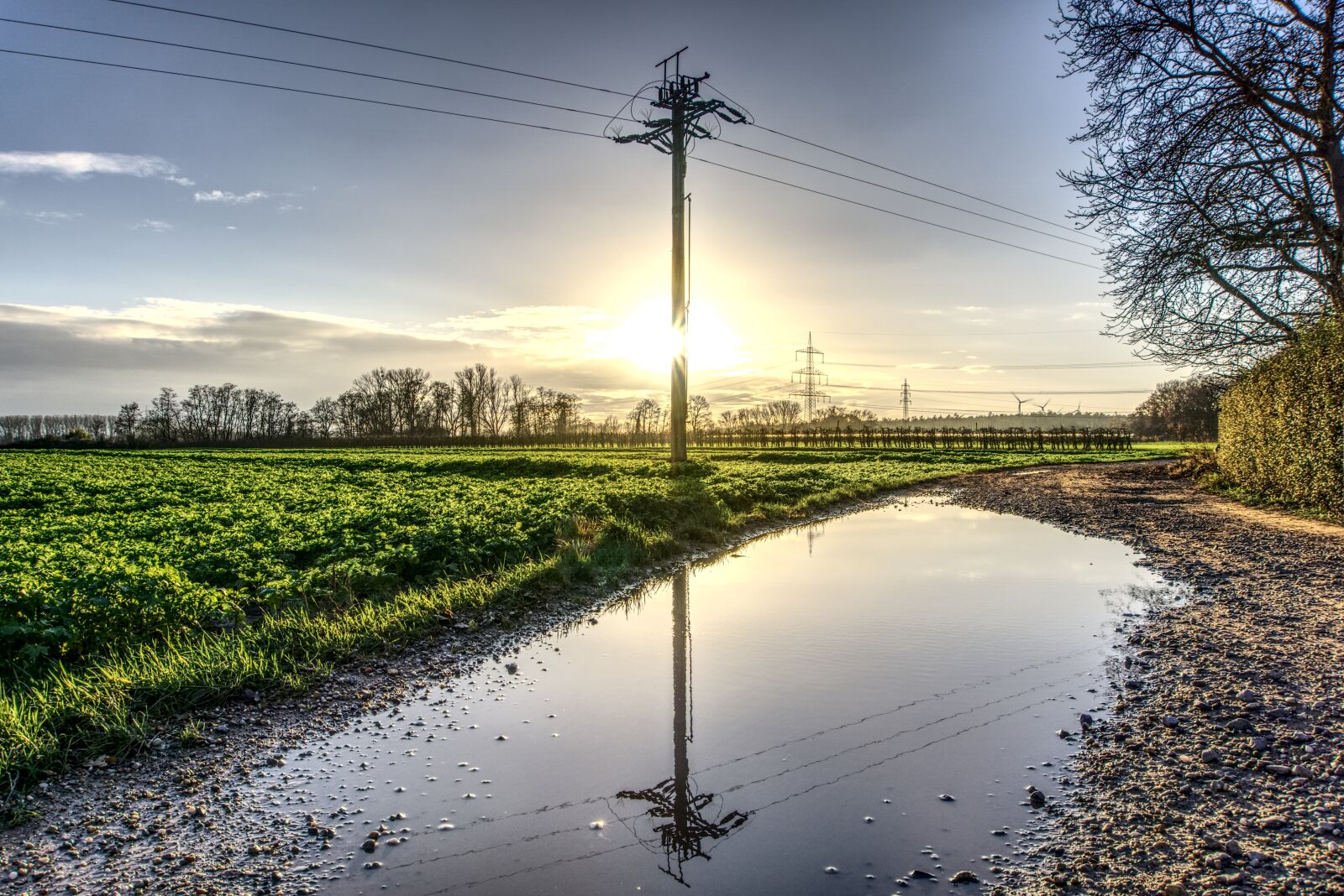 Sony a6000 sample photo. Mirroring, strommast, power line photography