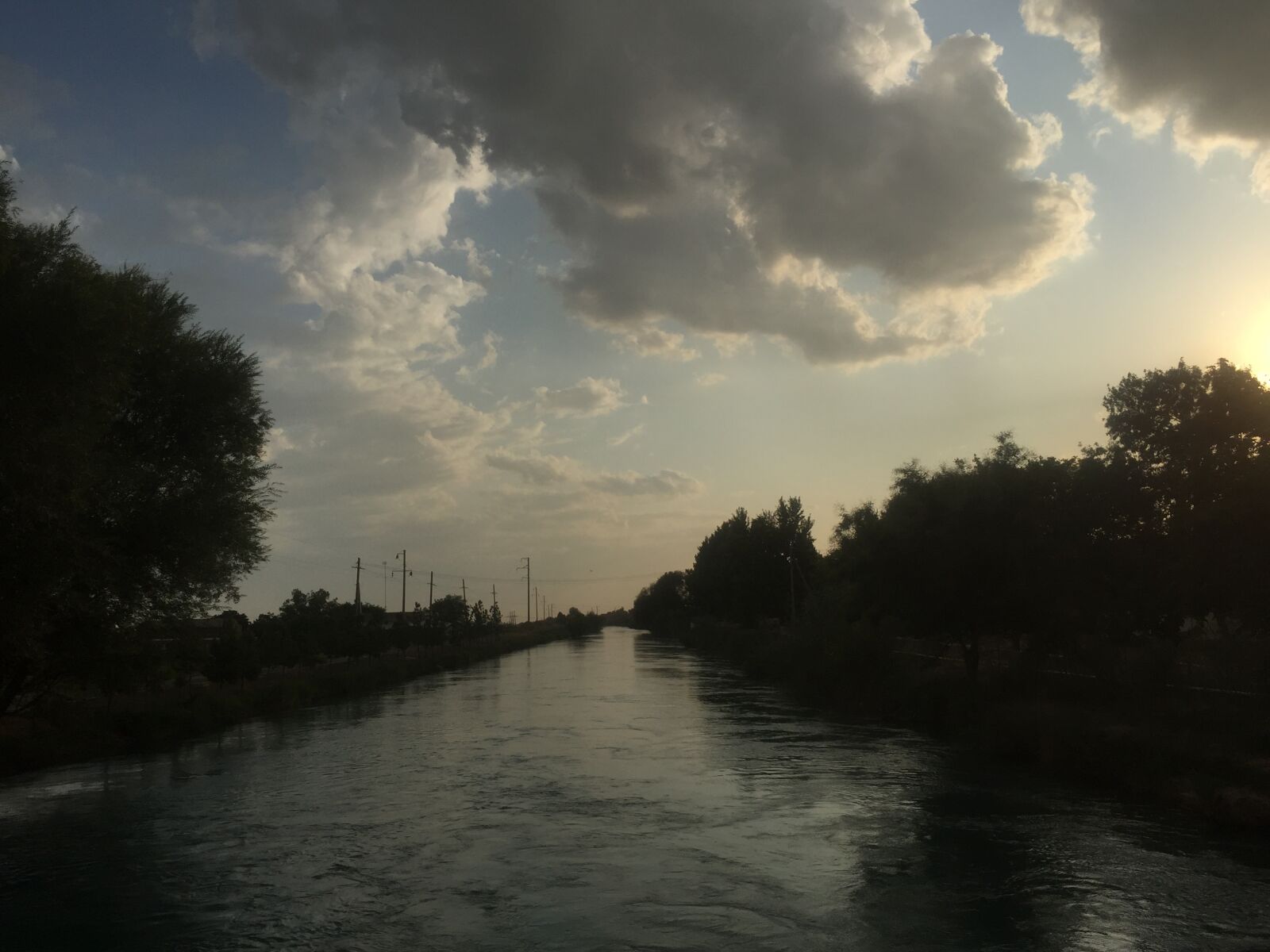iPhone 6 back camera 4.15mm f/2.2 sample photo. Clouds, river, landscape photography