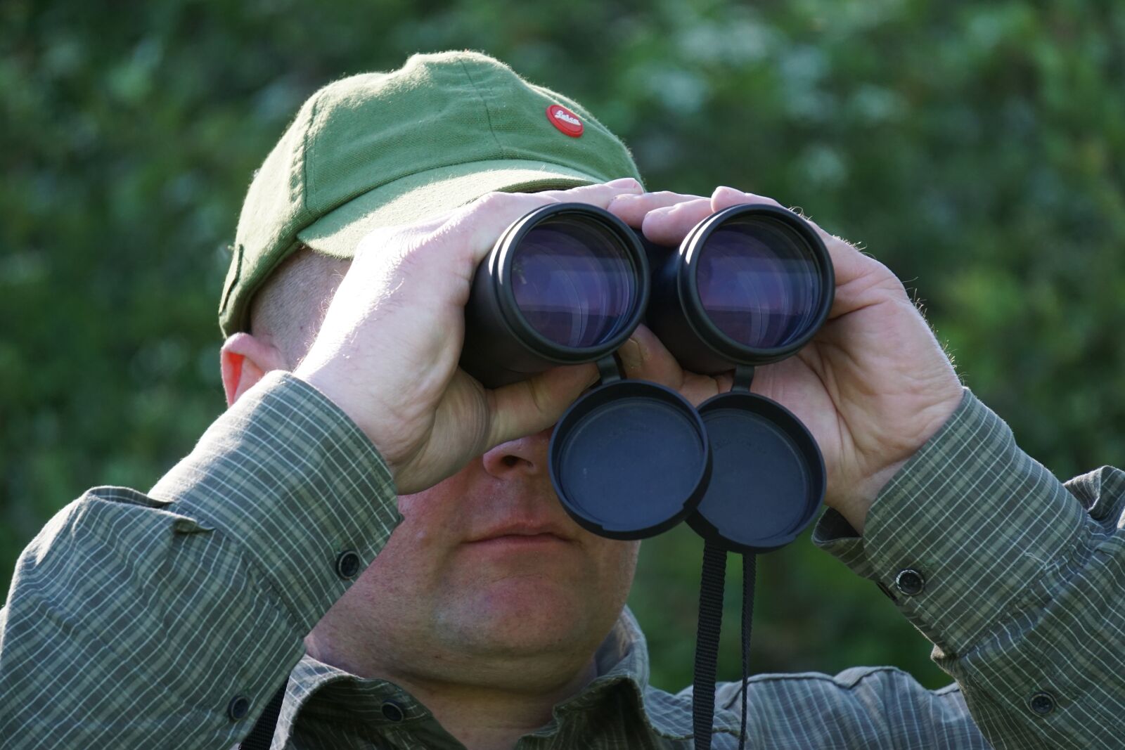 Sony a6000 sample photo. Hunter, binoculars, optics photography