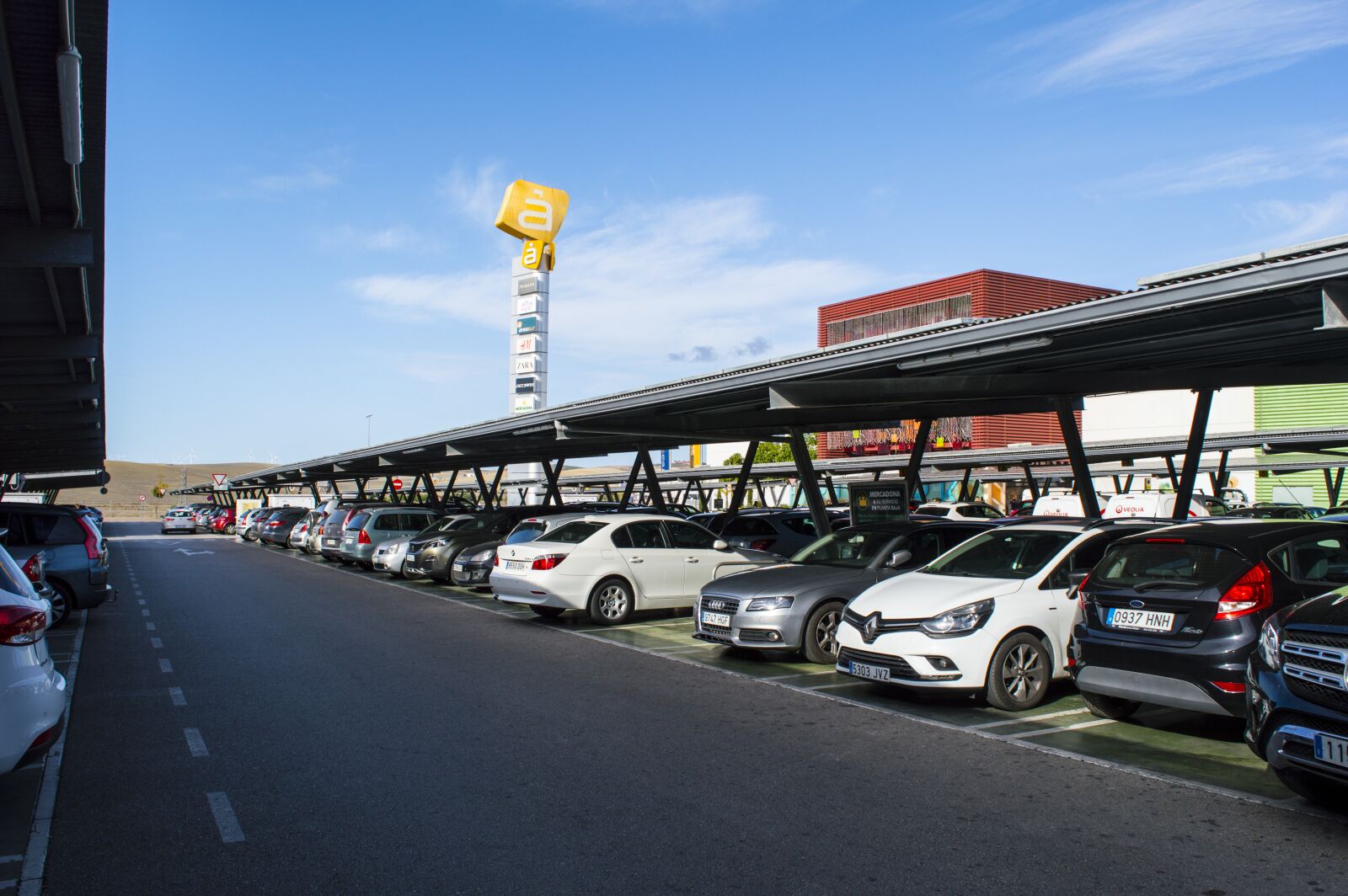 Nikon D3200 sample photo. Parking, machinery, hypermarket photography