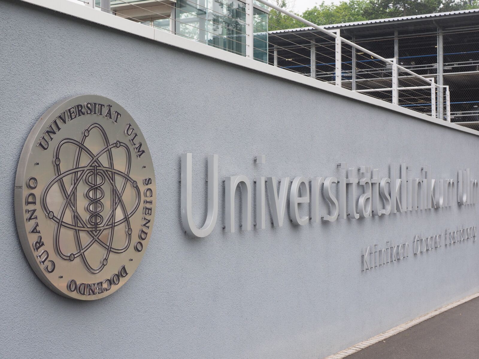 Olympus OM-D E-M1 + Olympus M.Zuiko Digital ED 12-40mm F2.8 Pro sample photo. University ulm, emblem, logo photography