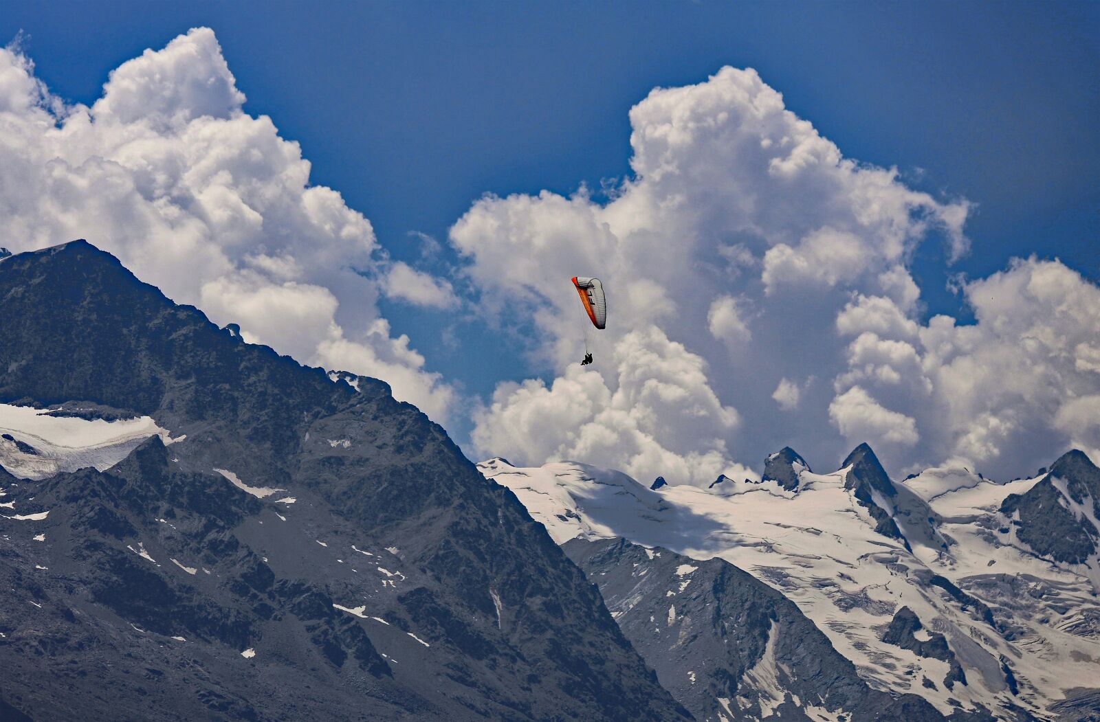 Panasonic Lumix DMC-GH3 sample photo. Paragliding, alpine crossing, bernina photography