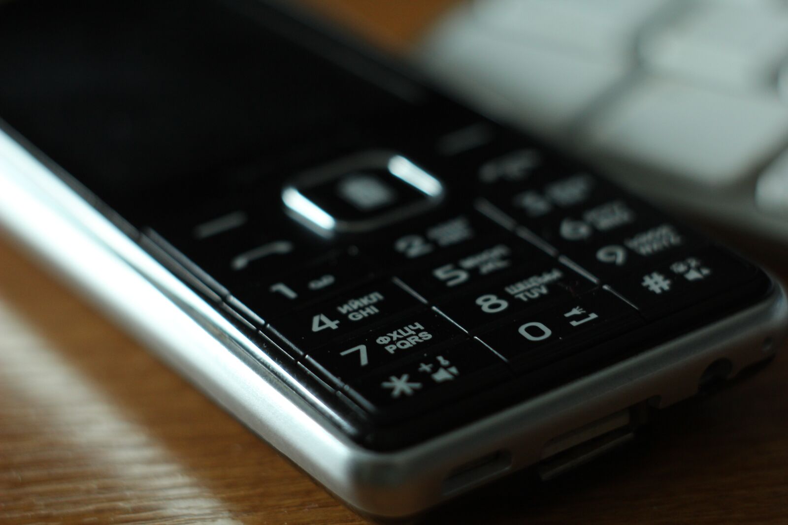 Canon EOS 60D sample photo. Phone, button, macro photography