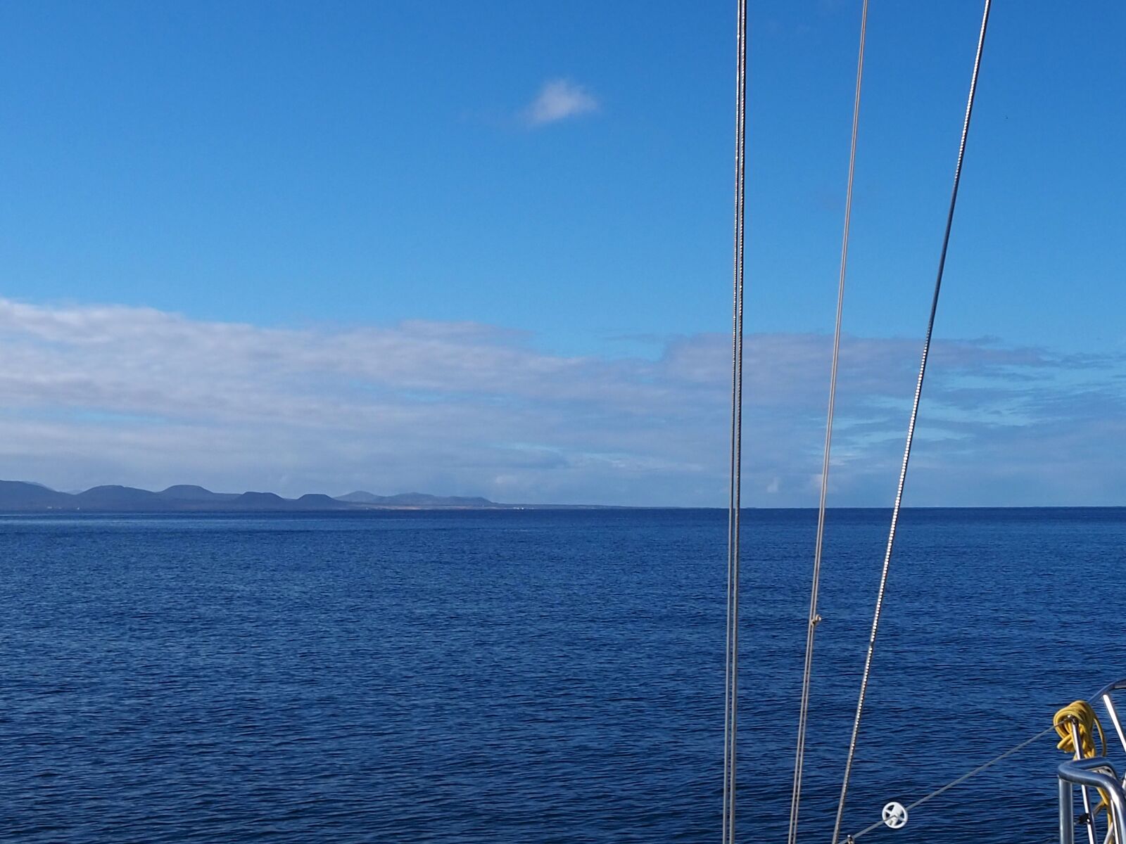 Olympus PEN E-PL9 sample photo. Lanzarote, sailboat, deck chair photography