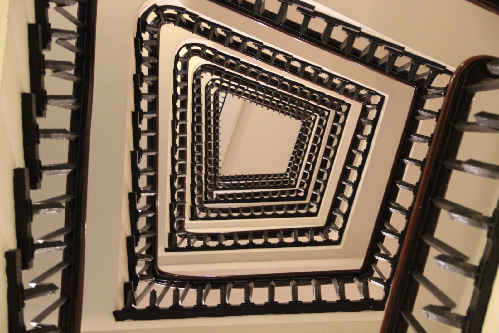 Canon EF-S 18-135mm F3.5-5.6 IS sample photo. Spiral staircase, texture, top photography